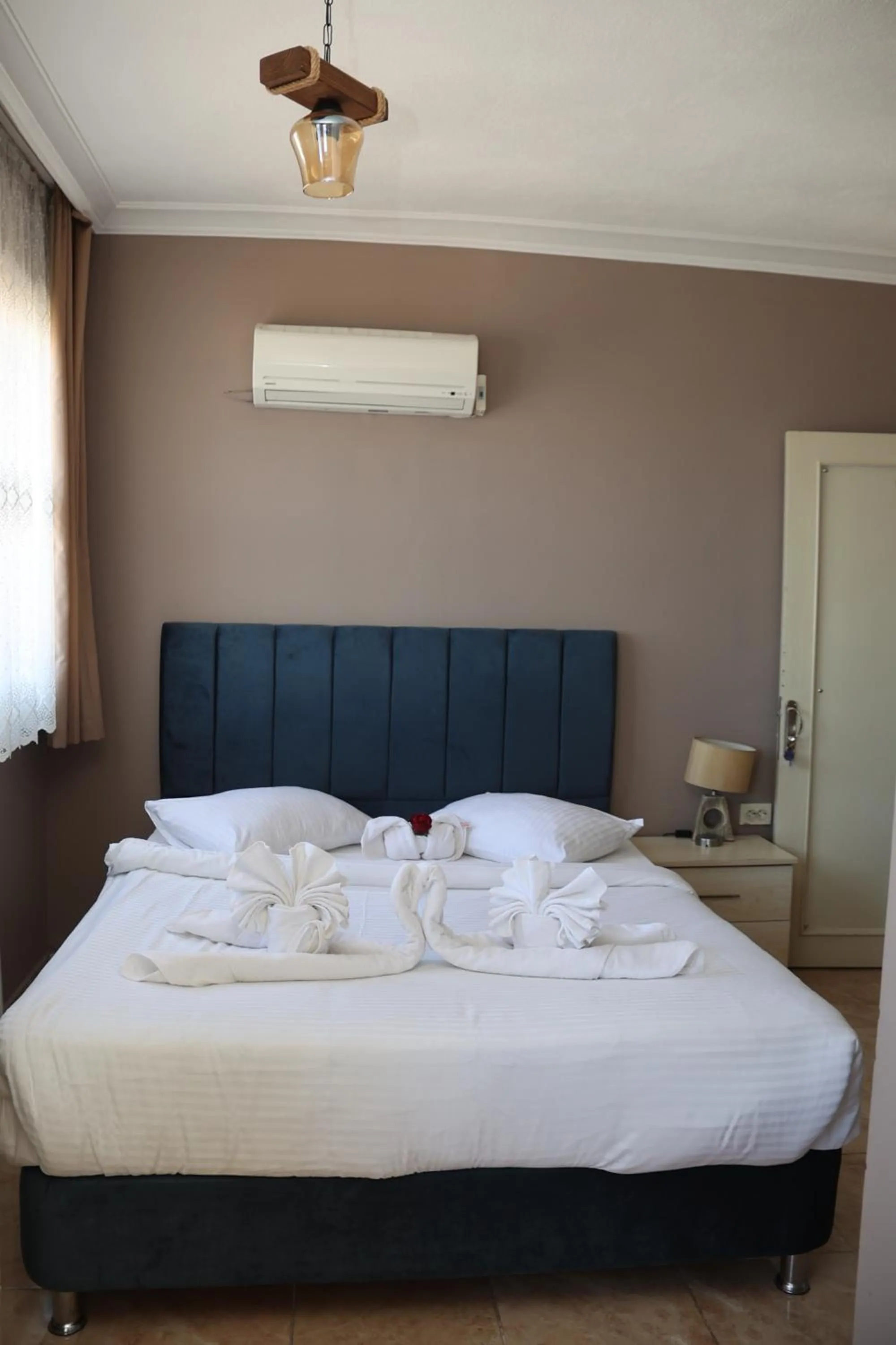 Toilet, Bed in Grand Koru Hotel Beach