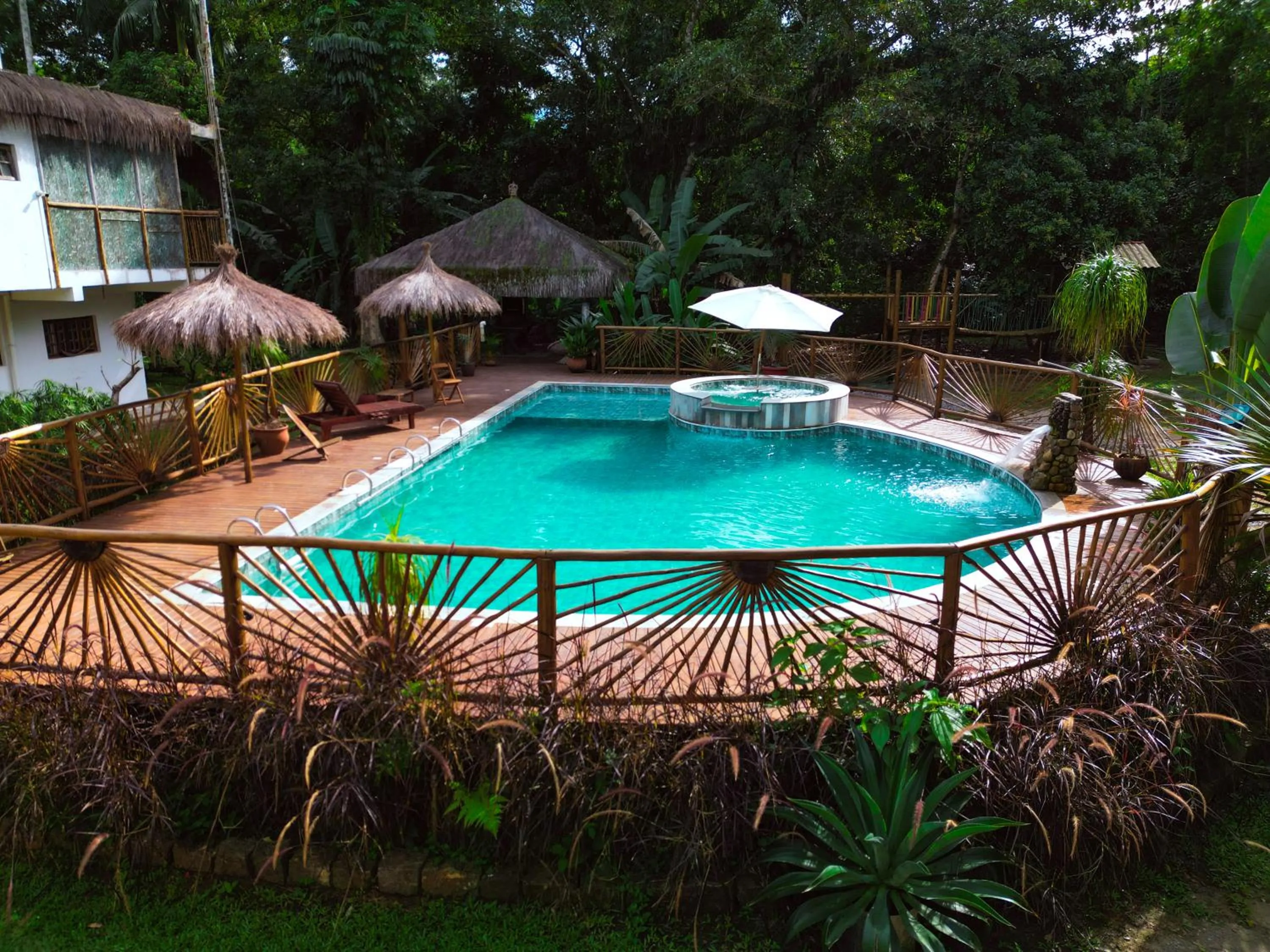 Pool view in VELINN Pousada Bali Itamambuca
