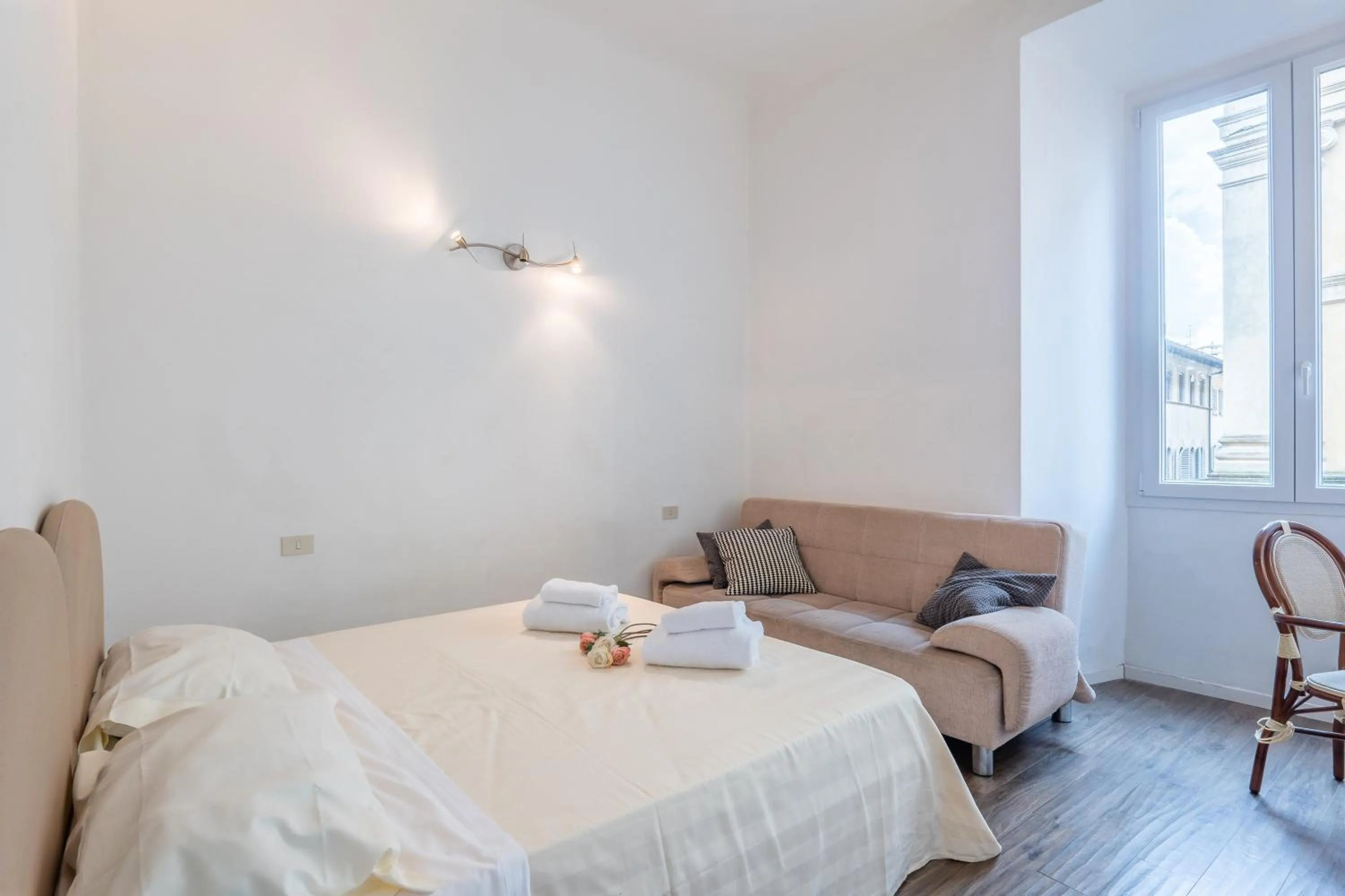 Bed in Palazzo Vecchio Apartments by Mmega