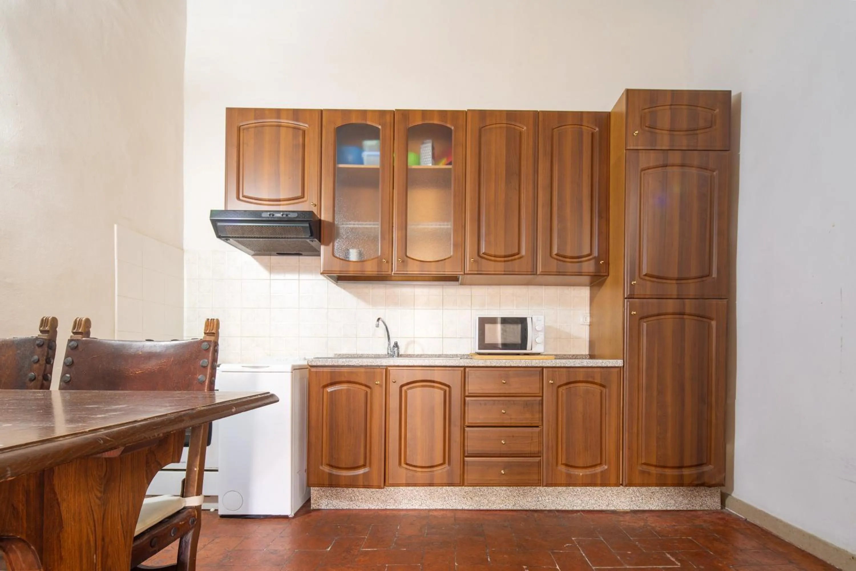Kitchen or kitchenette in Palazzo Vecchio Apartments by Mmega