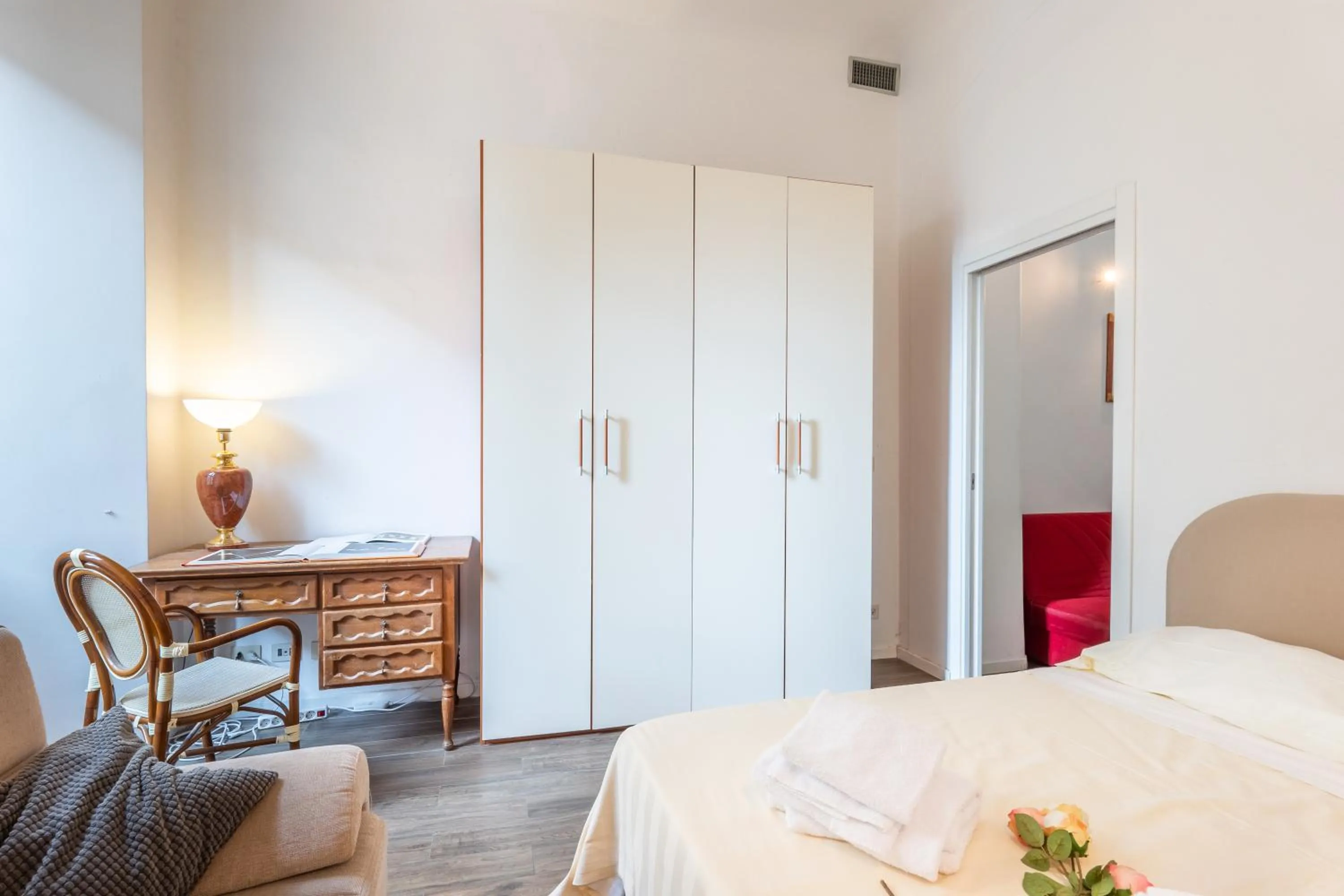 Bed in Palazzo Vecchio Apartments by Mmega