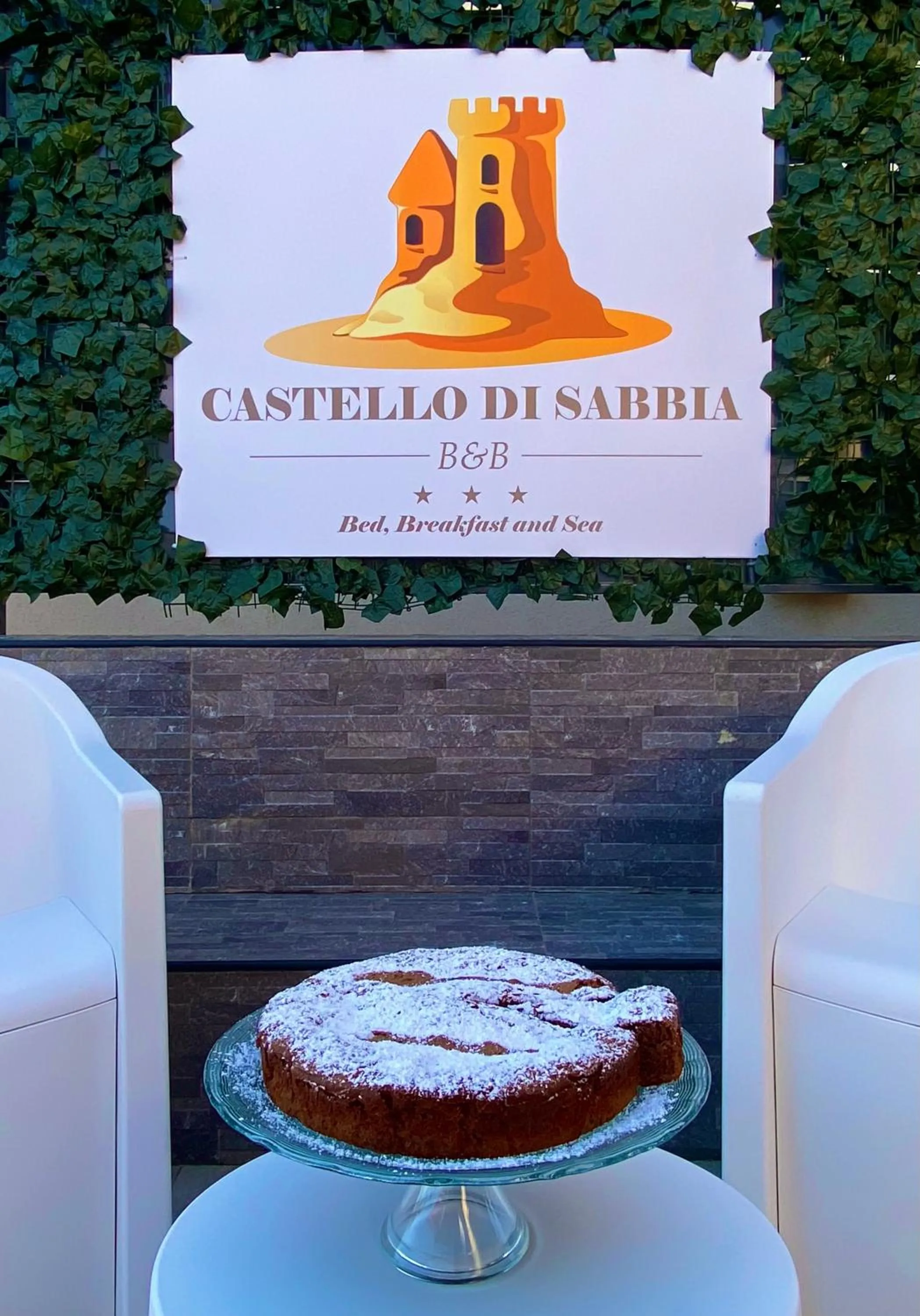 Property logo or sign in Castello di Sabbia