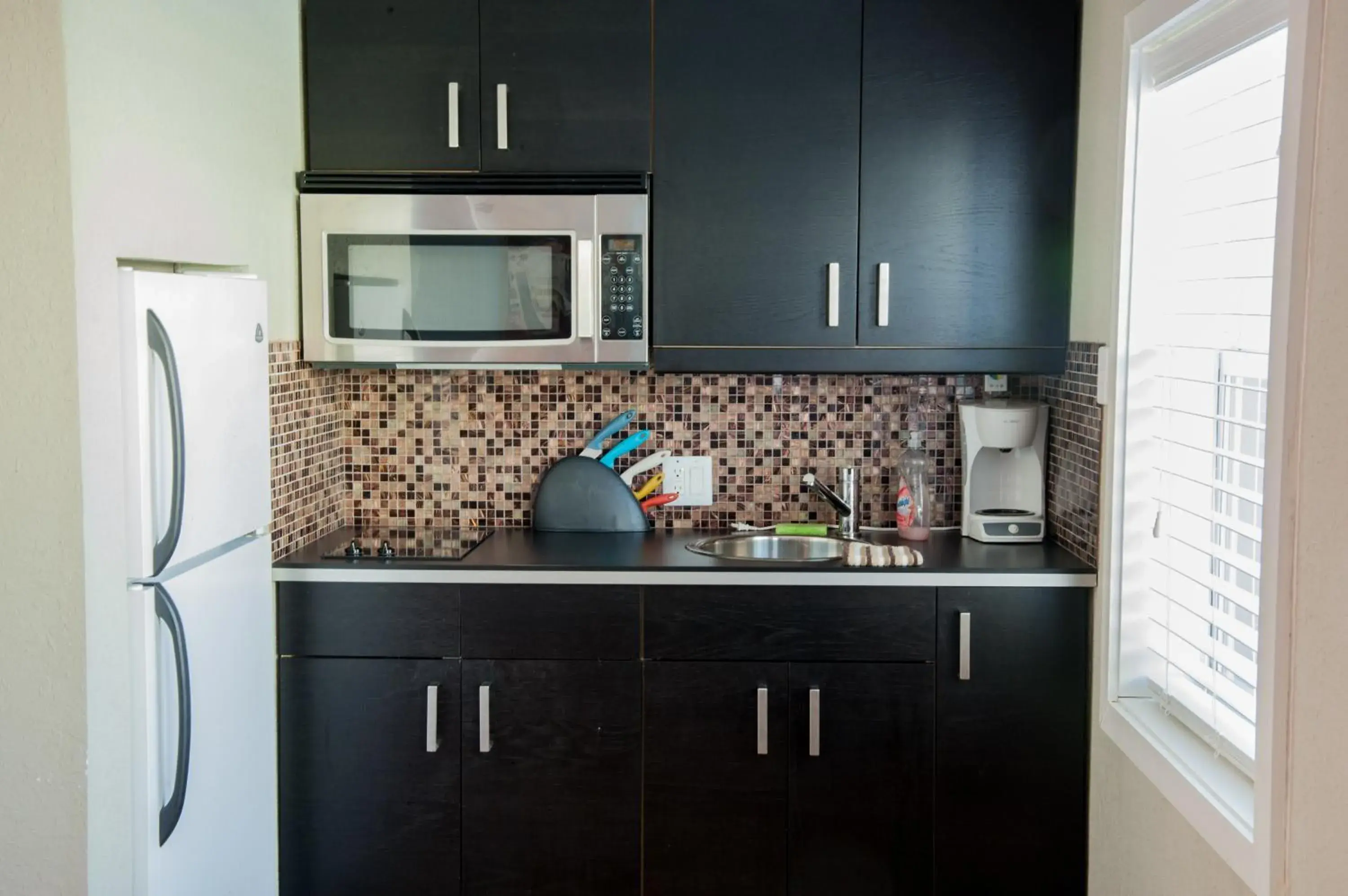 Kitchen or kitchenette in Sun Beach Inn Kitchen or kitchenette in Sun Beach Inn