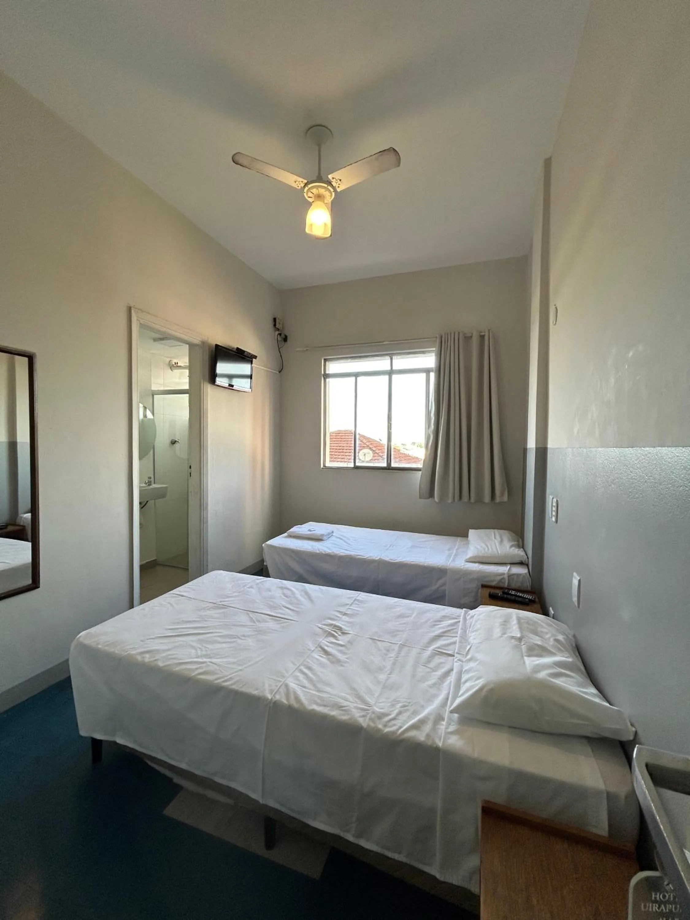 Photo of the whole room, Bed in Novo Hotel Uirapuru