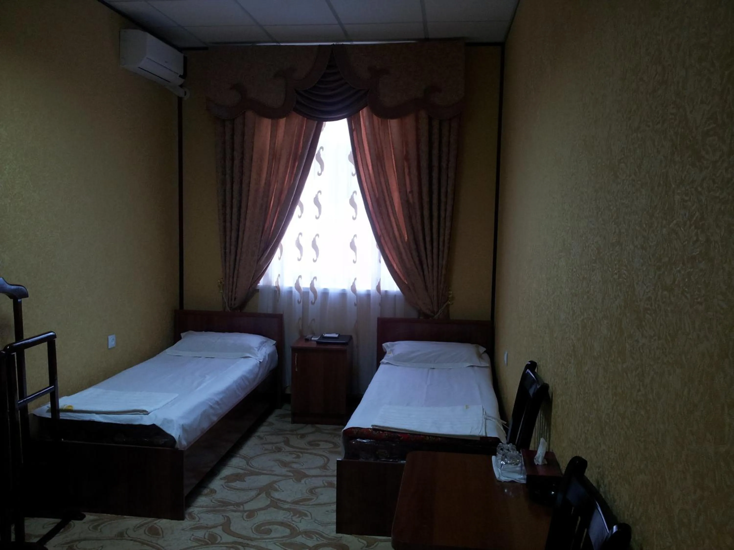 Bed in Dangara Hotel