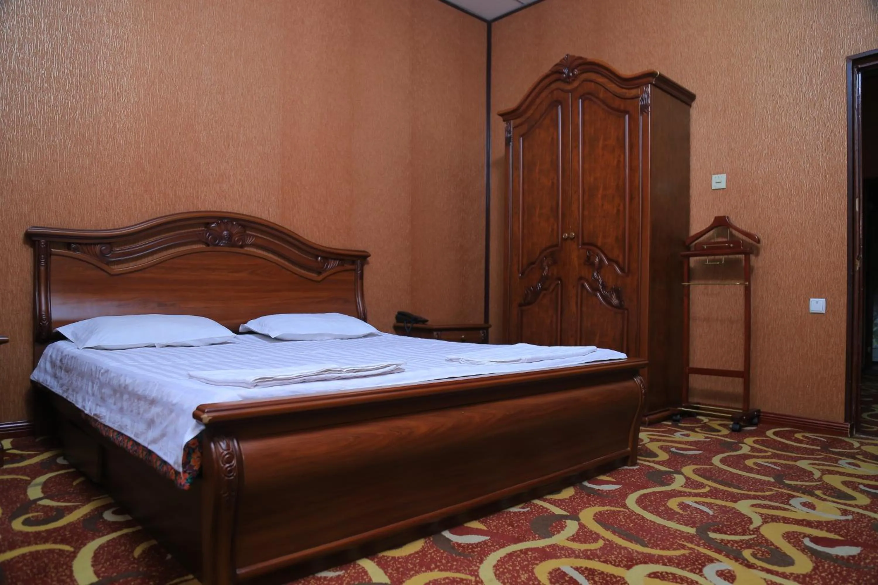 Bed in Dangara Hotel