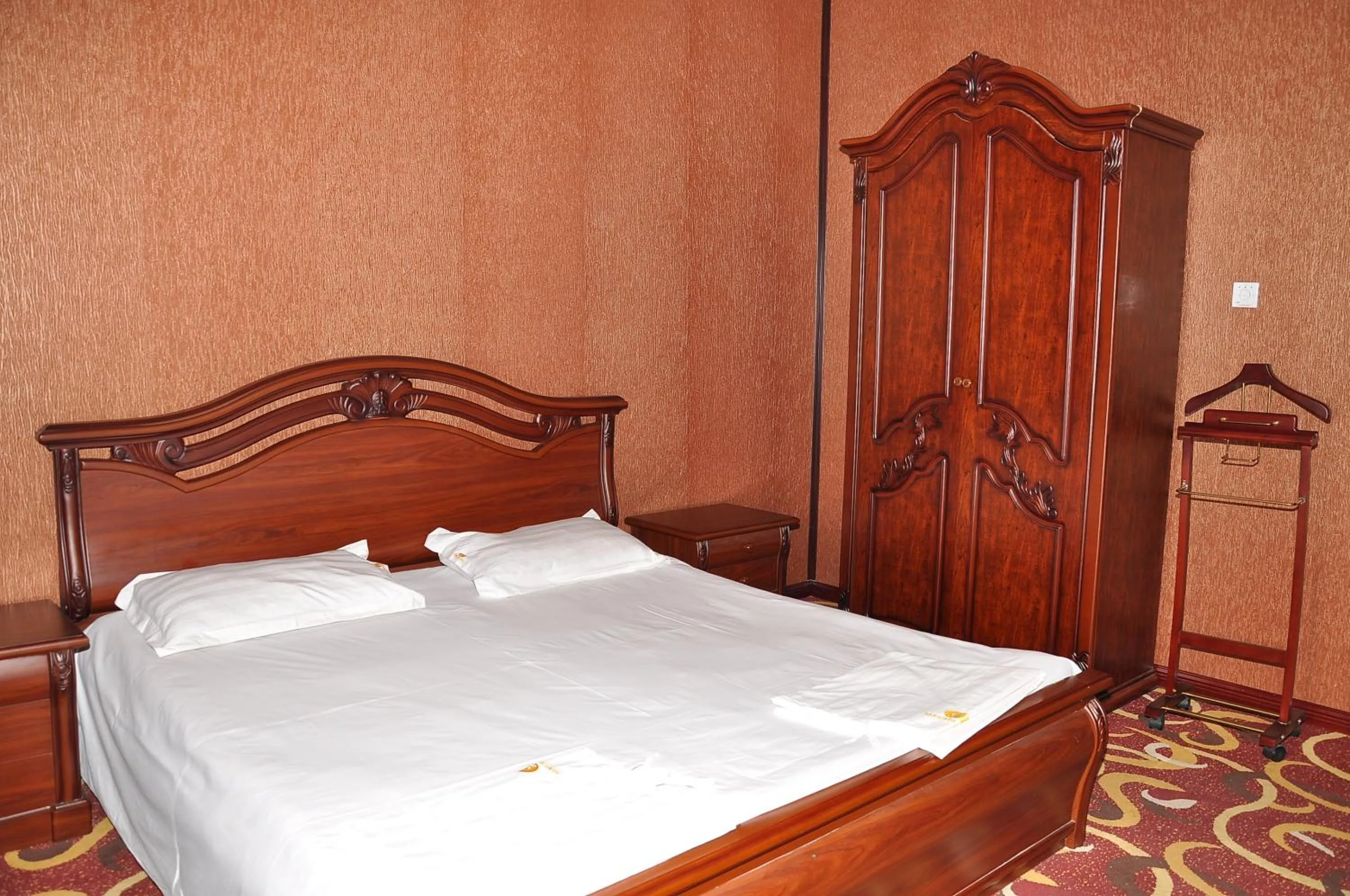 Bed in Dangara Hotel