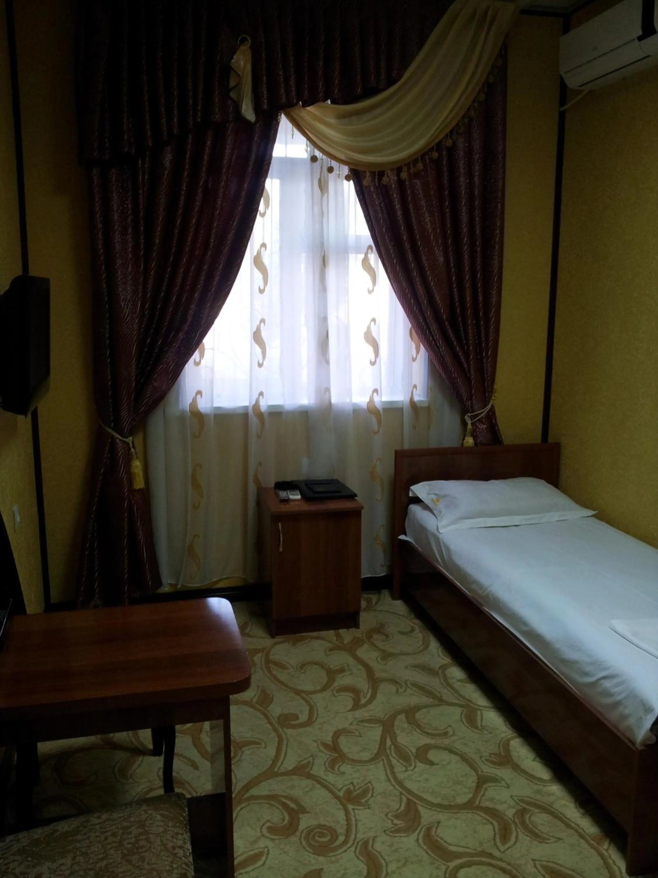 Bed in Dangara Hotel