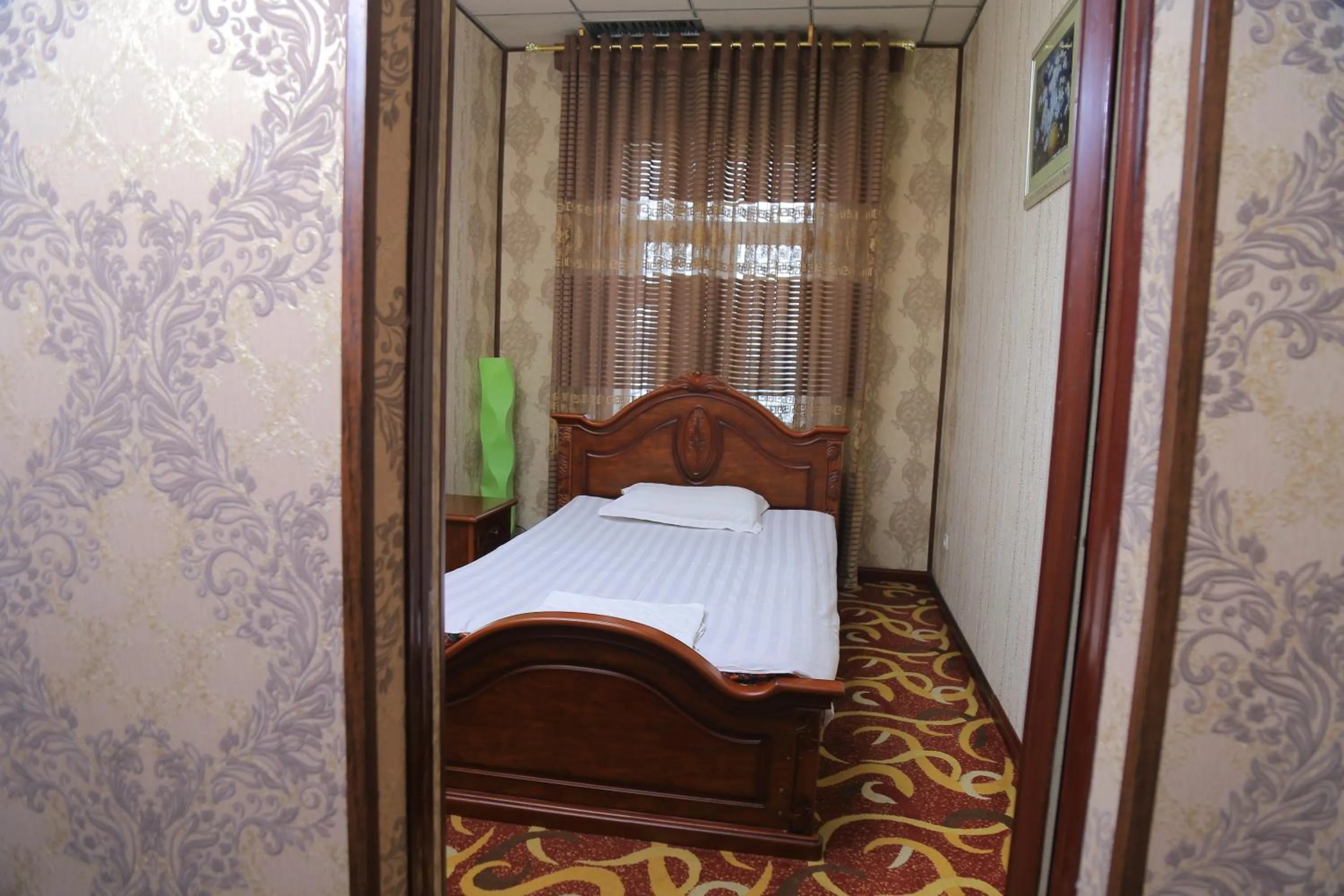 Bed in Dangara Hotel
