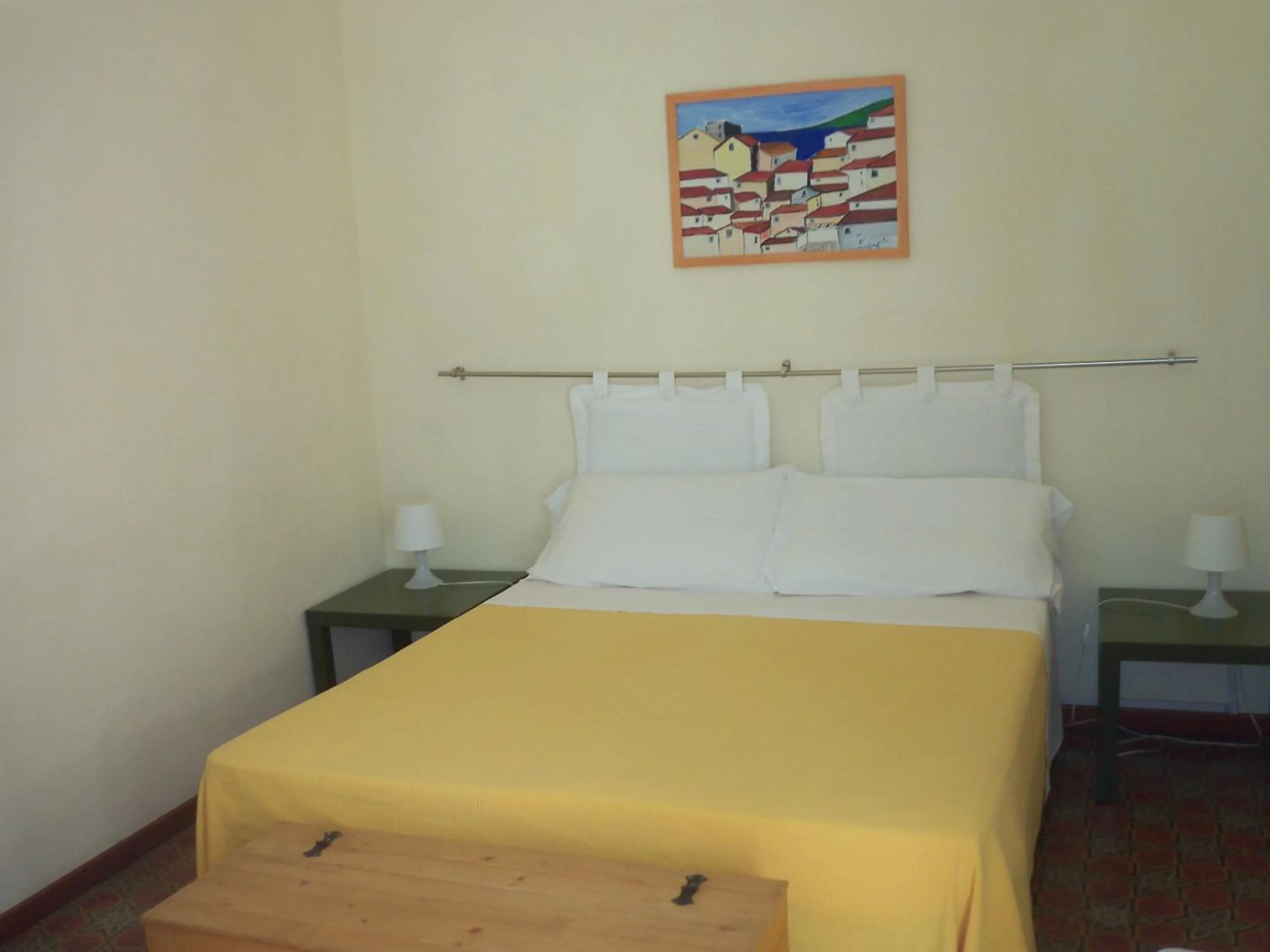 Photo of the whole room, Bed in B&B CARAVAGGIO basic rooms near Ortigia