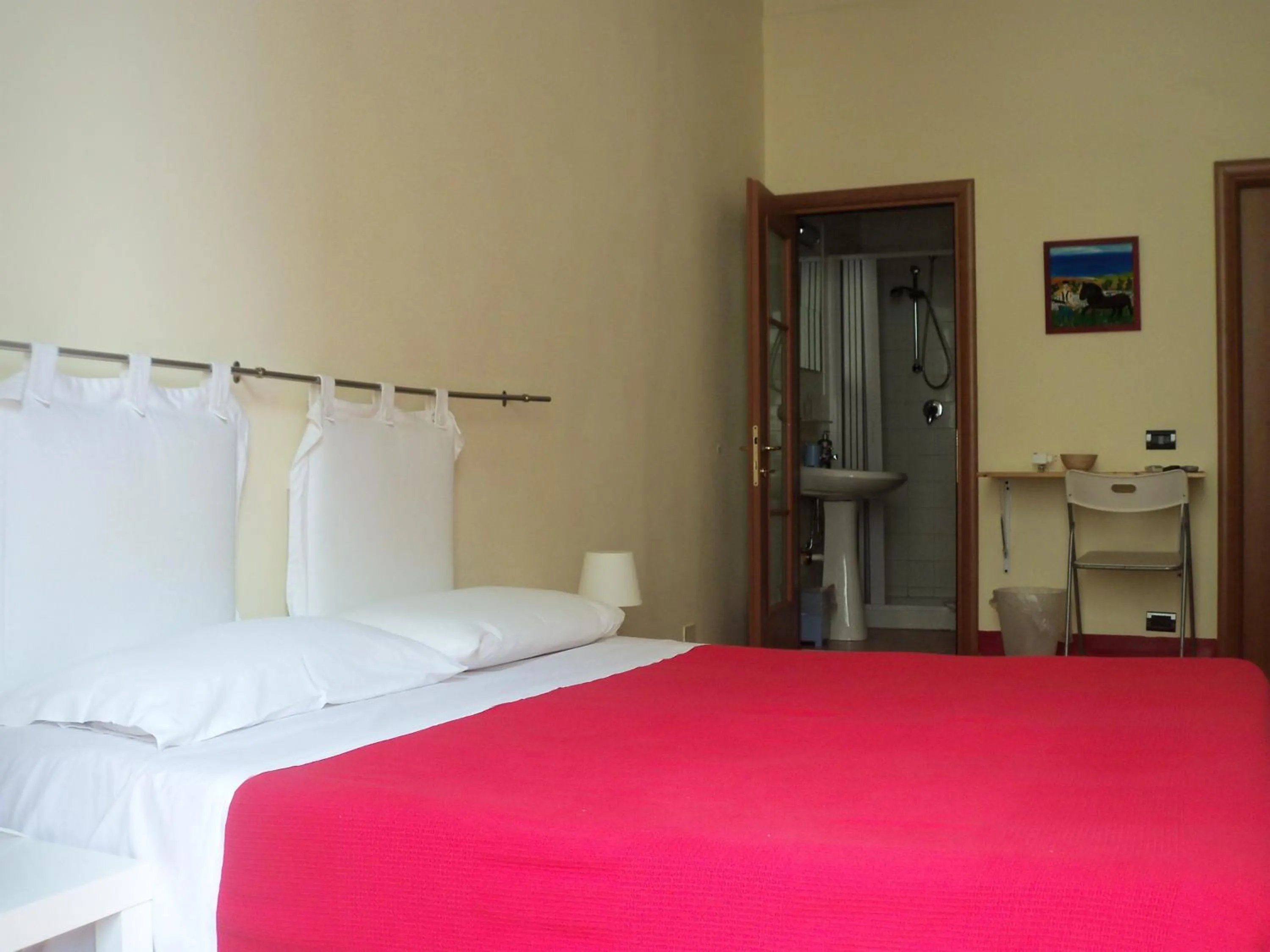 Photo of the whole room, Bed in B&B CARAVAGGIO basic rooms near Ortigia