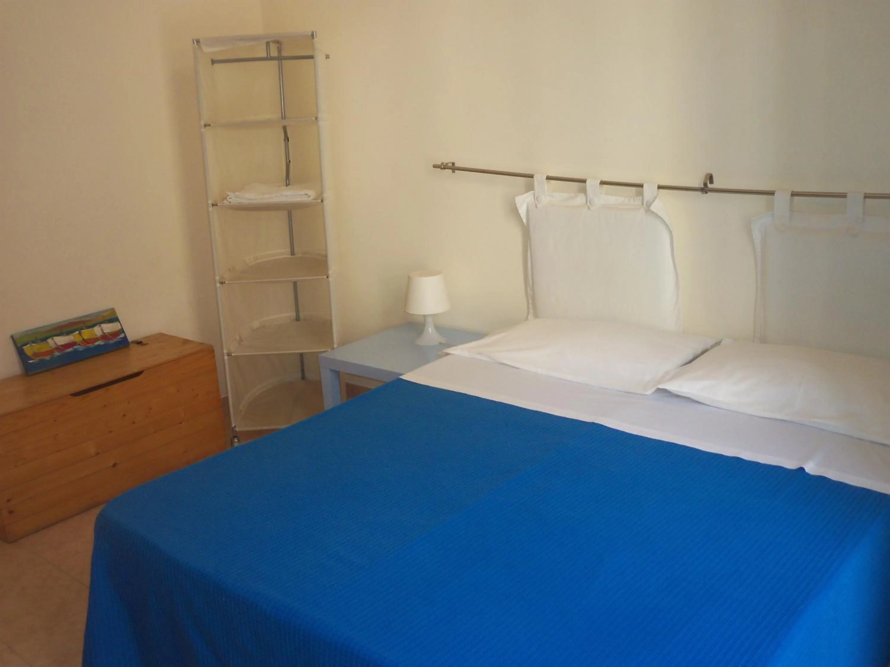 Photo of the whole room, Bed in B&B CARAVAGGIO basic rooms near Ortigia