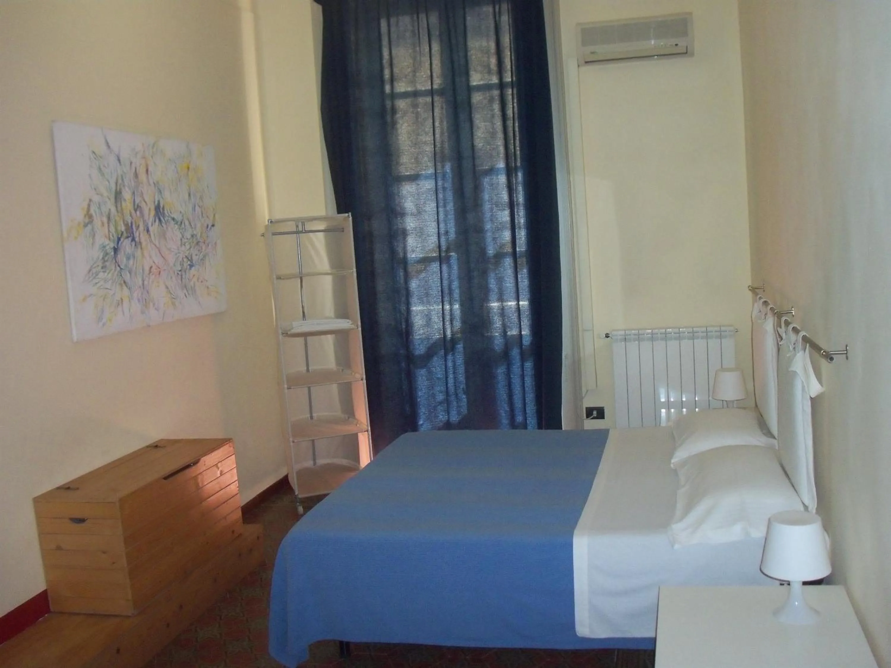 Photo of the whole room, Bed in B&B CARAVAGGIO basic rooms near Ortigia