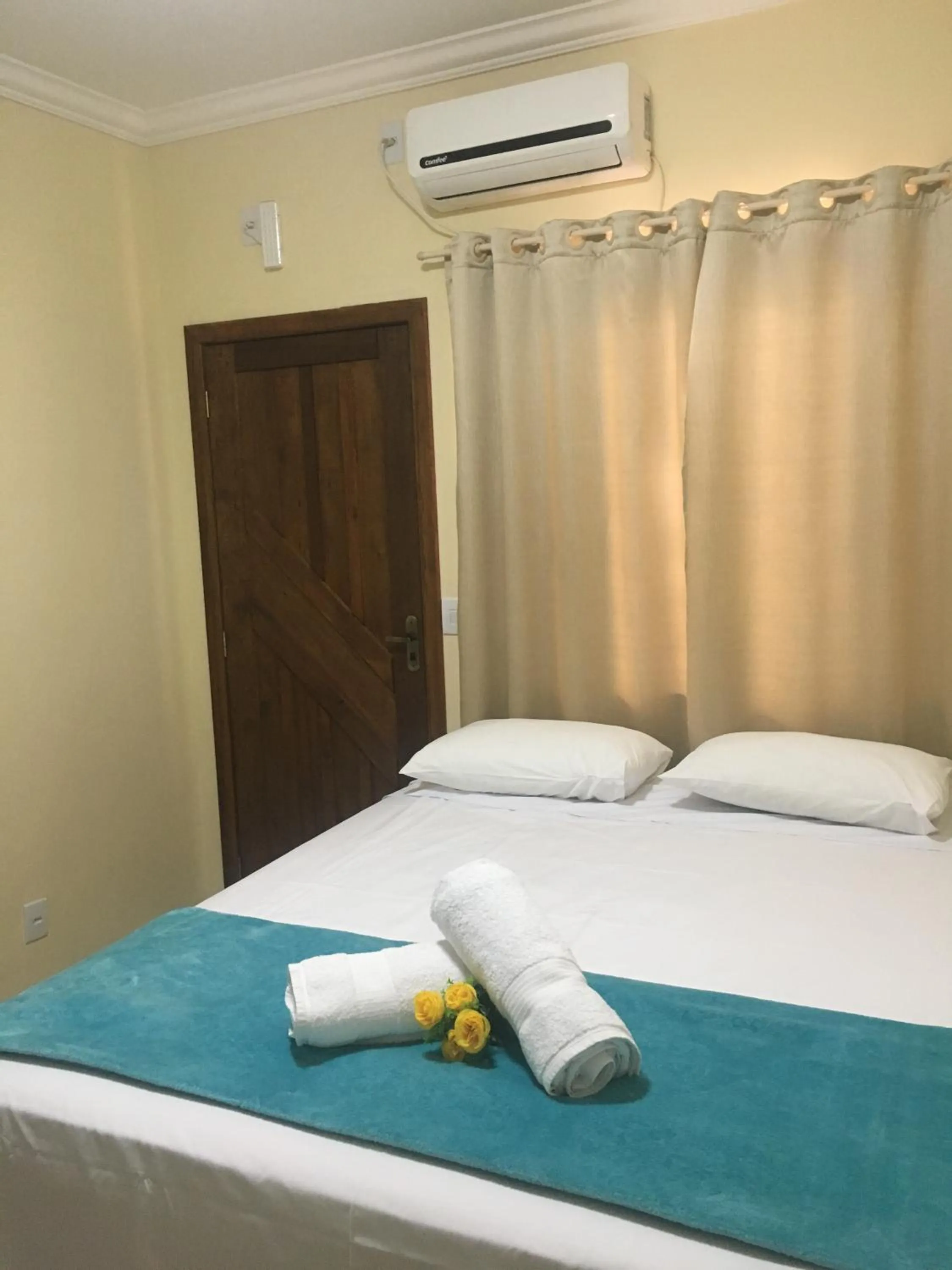 Bed in Pousada Vila Regina