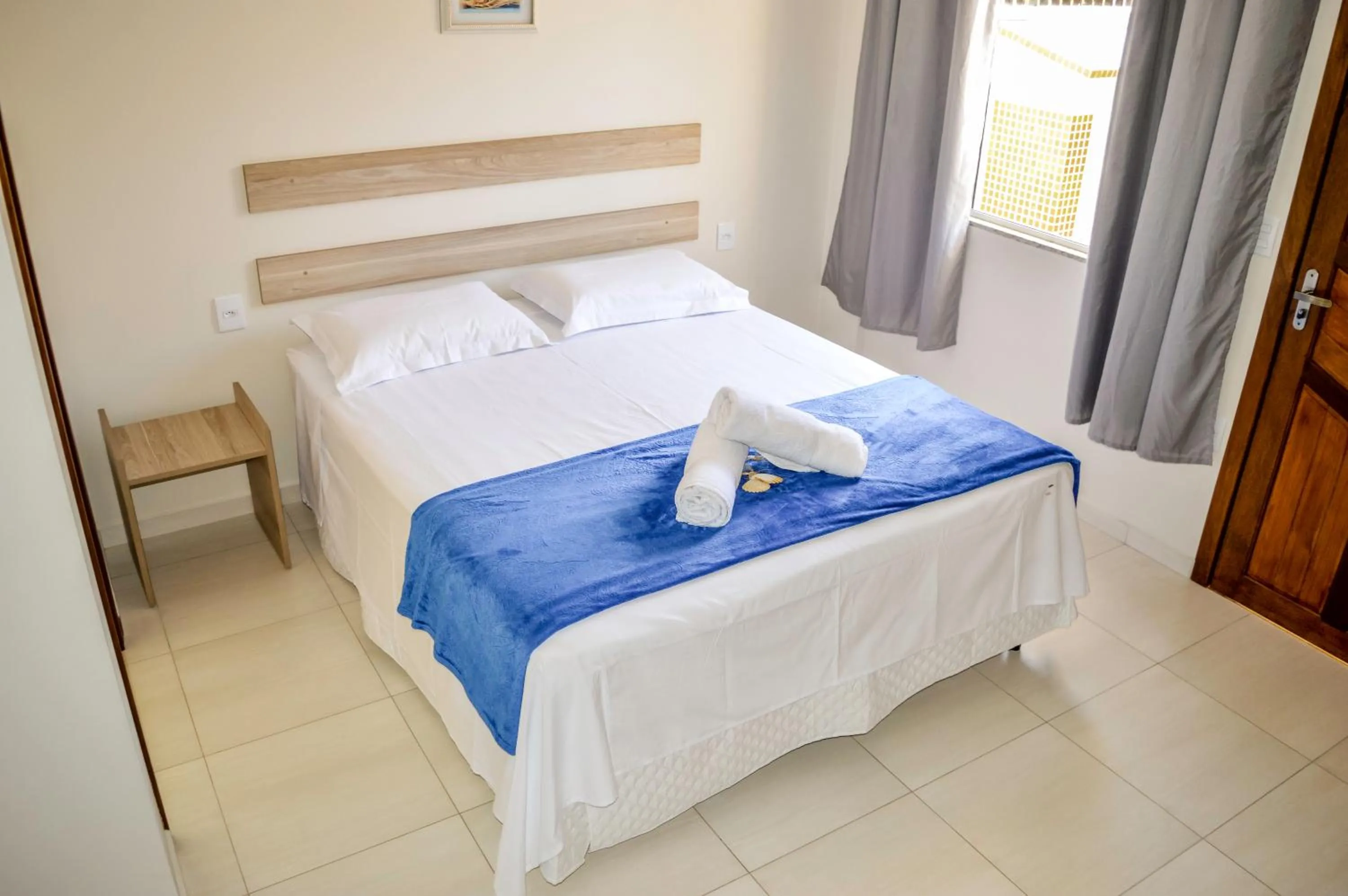 Bed in Pousada Vila Regina