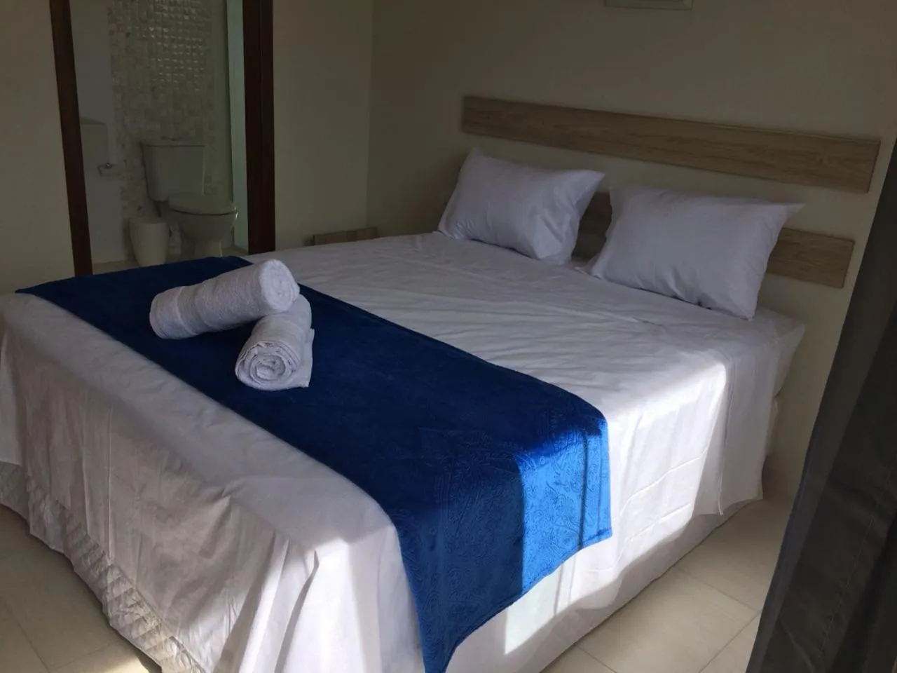 Bed in Pousada Vila Regina