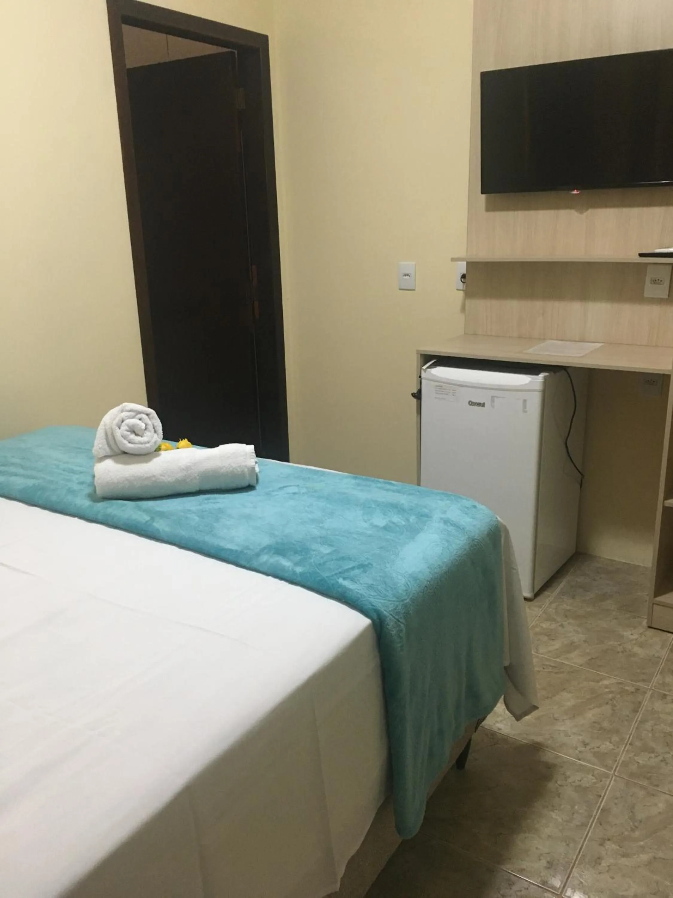 Bed in Pousada Vila Regina