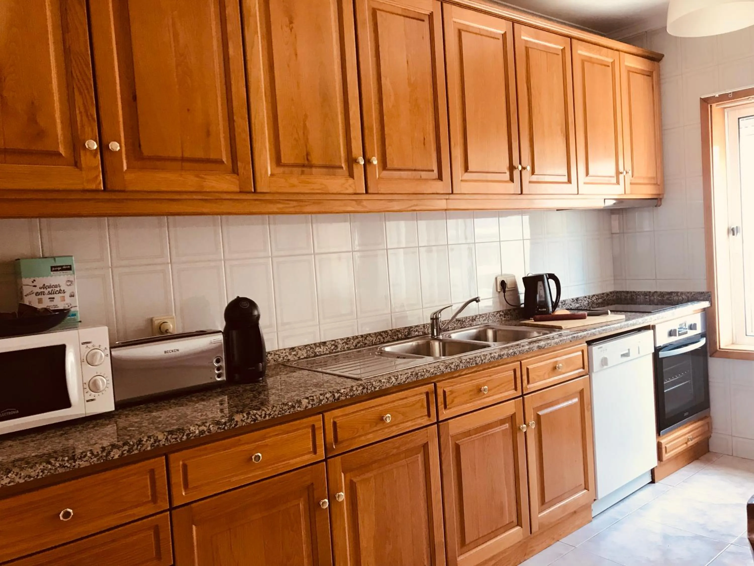 Kitchen or kitchenette in Holiday Flat Green Coast