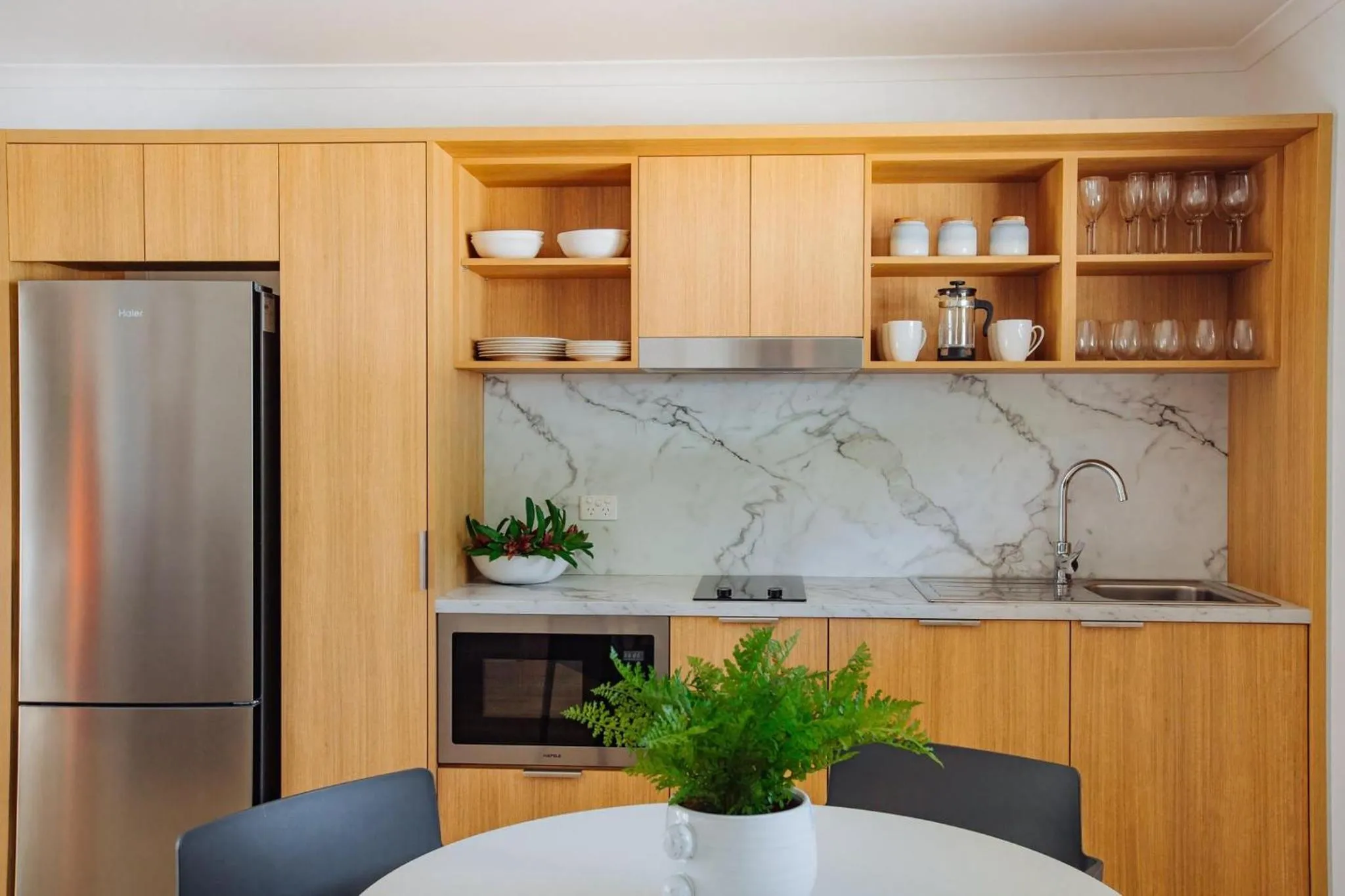 Kitchen or kitchenette in BIG4 Sandstone Point Holiday Resort Bribie Island