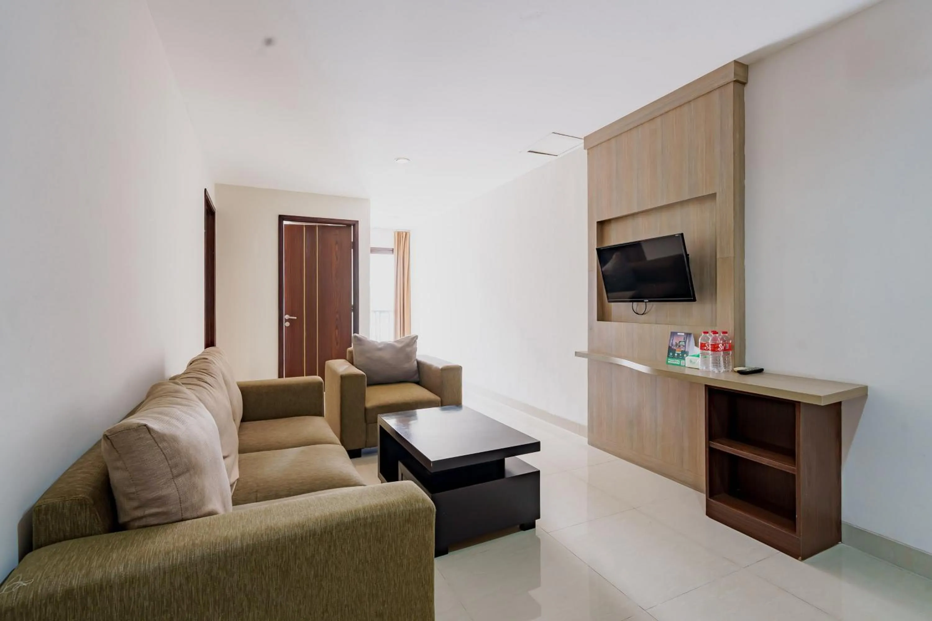 Seating area in Sans Vibes Jasmine Suite TB Simatupang