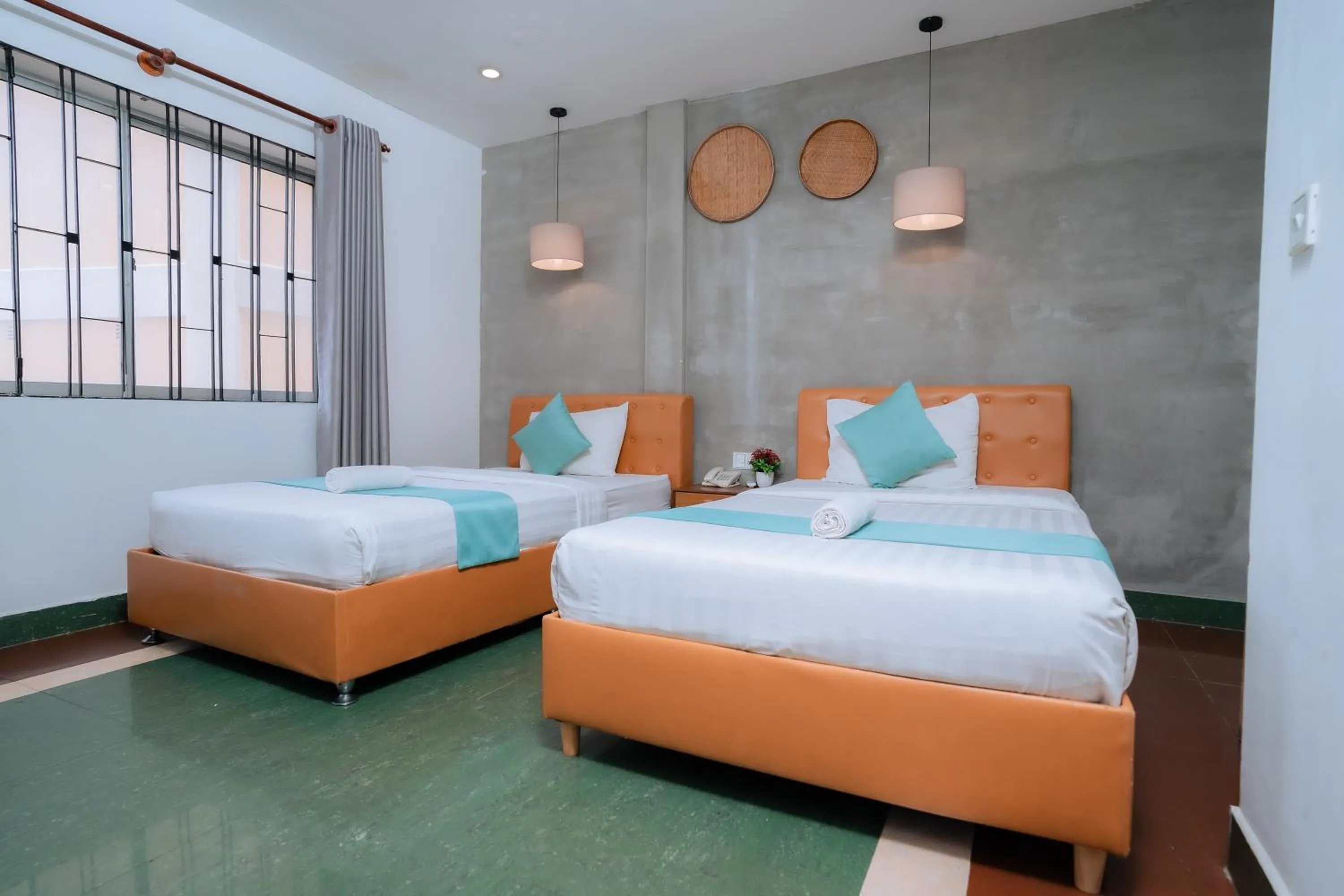 Bed in Grand Elevation Hotel