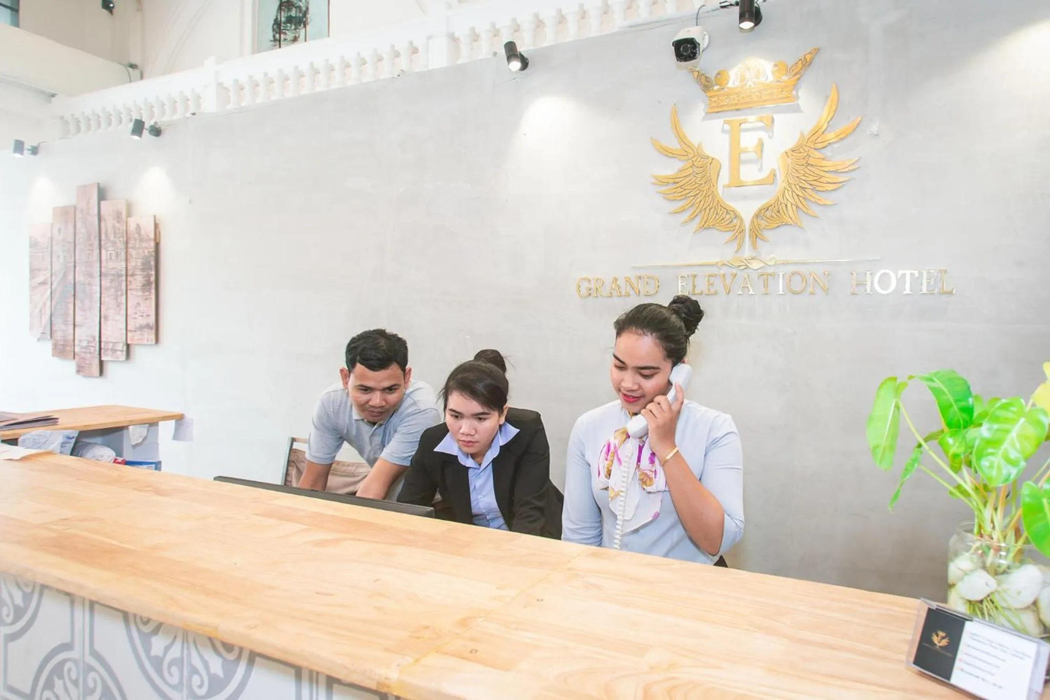 Staff in Grand Elevation Hotel