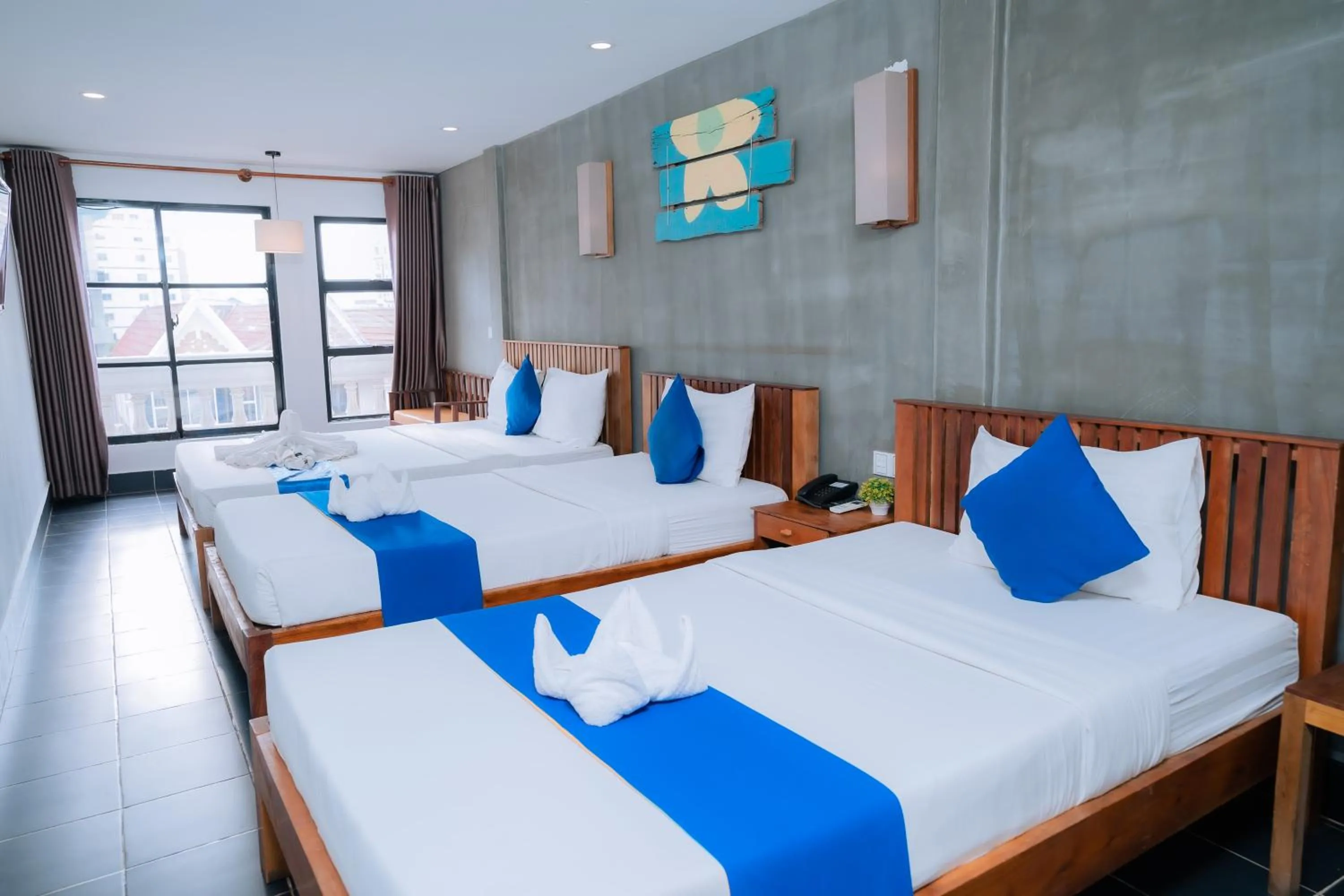 Bed in Grand Elevation Hotel