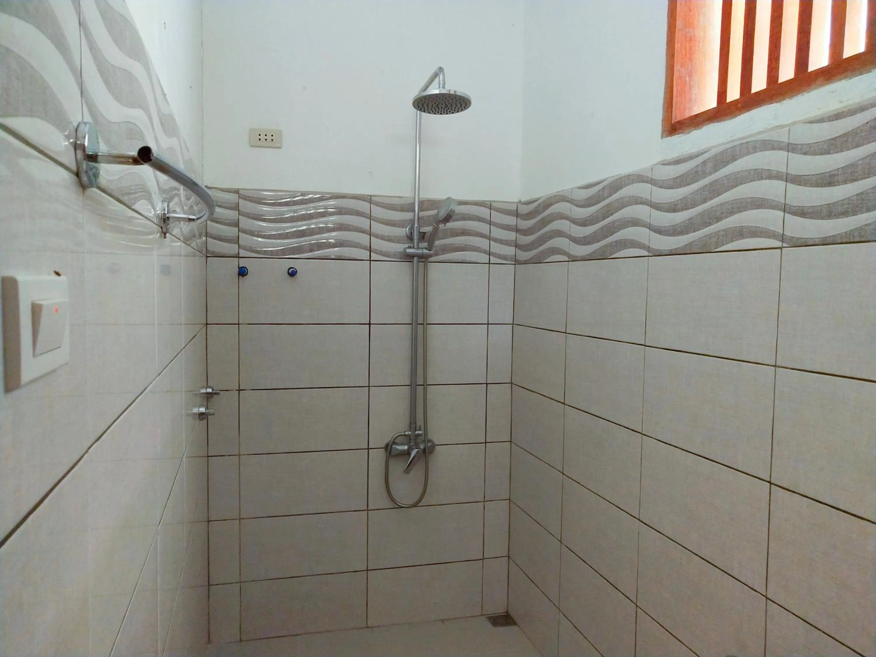 Shower in Victordelia Hilltop Hostel