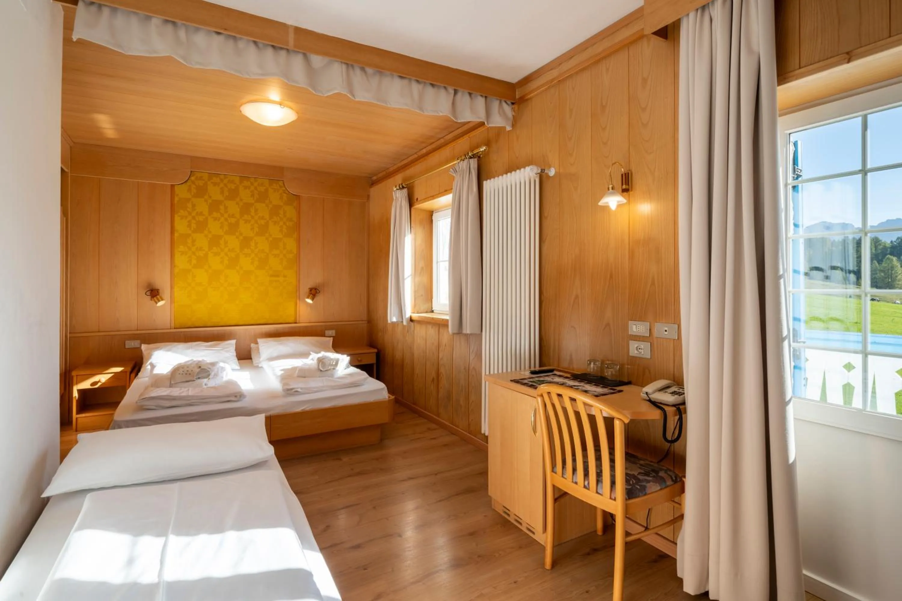 Bed in MyTime Hotels Savoy