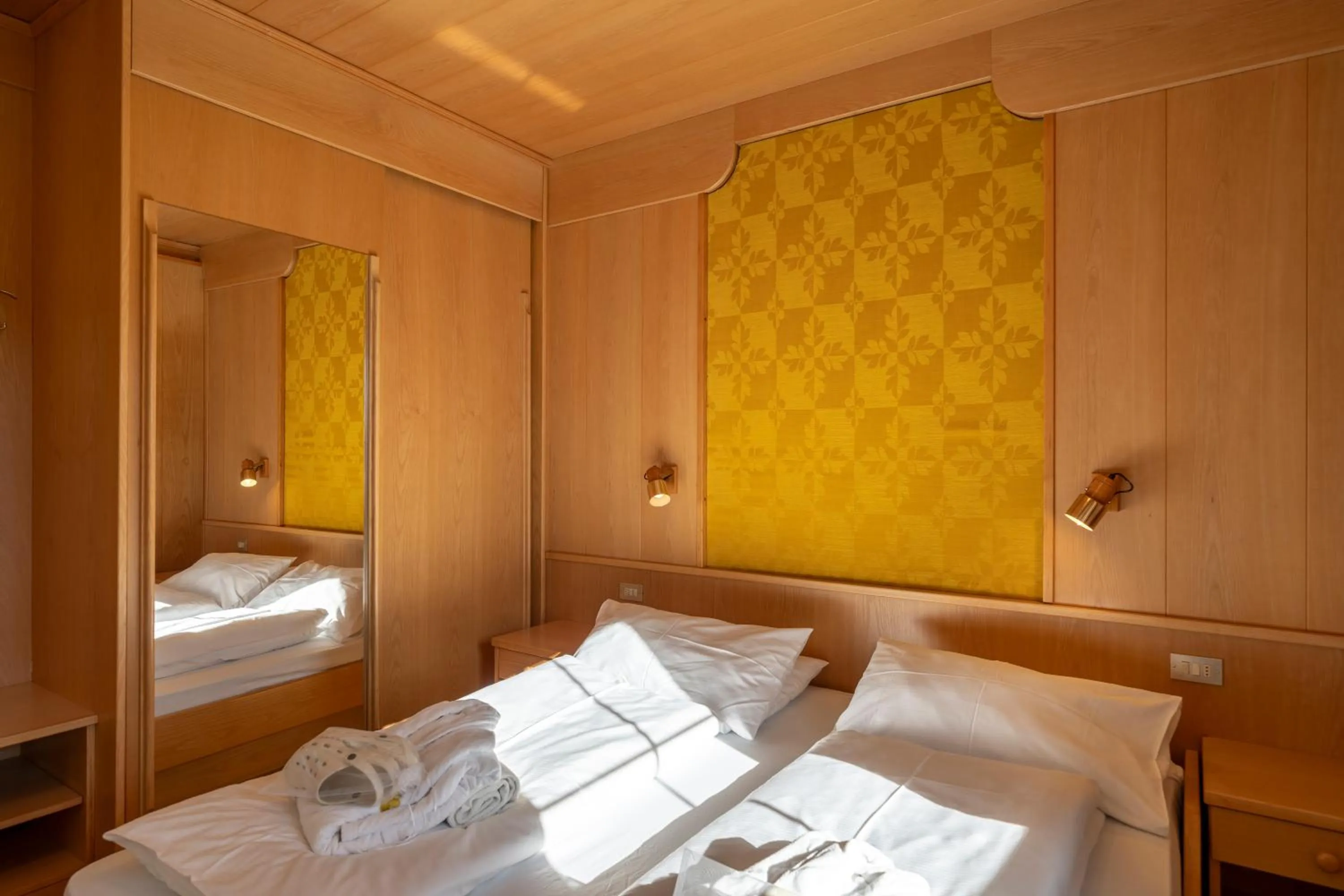 Bed in MyTime Hotels Savoy