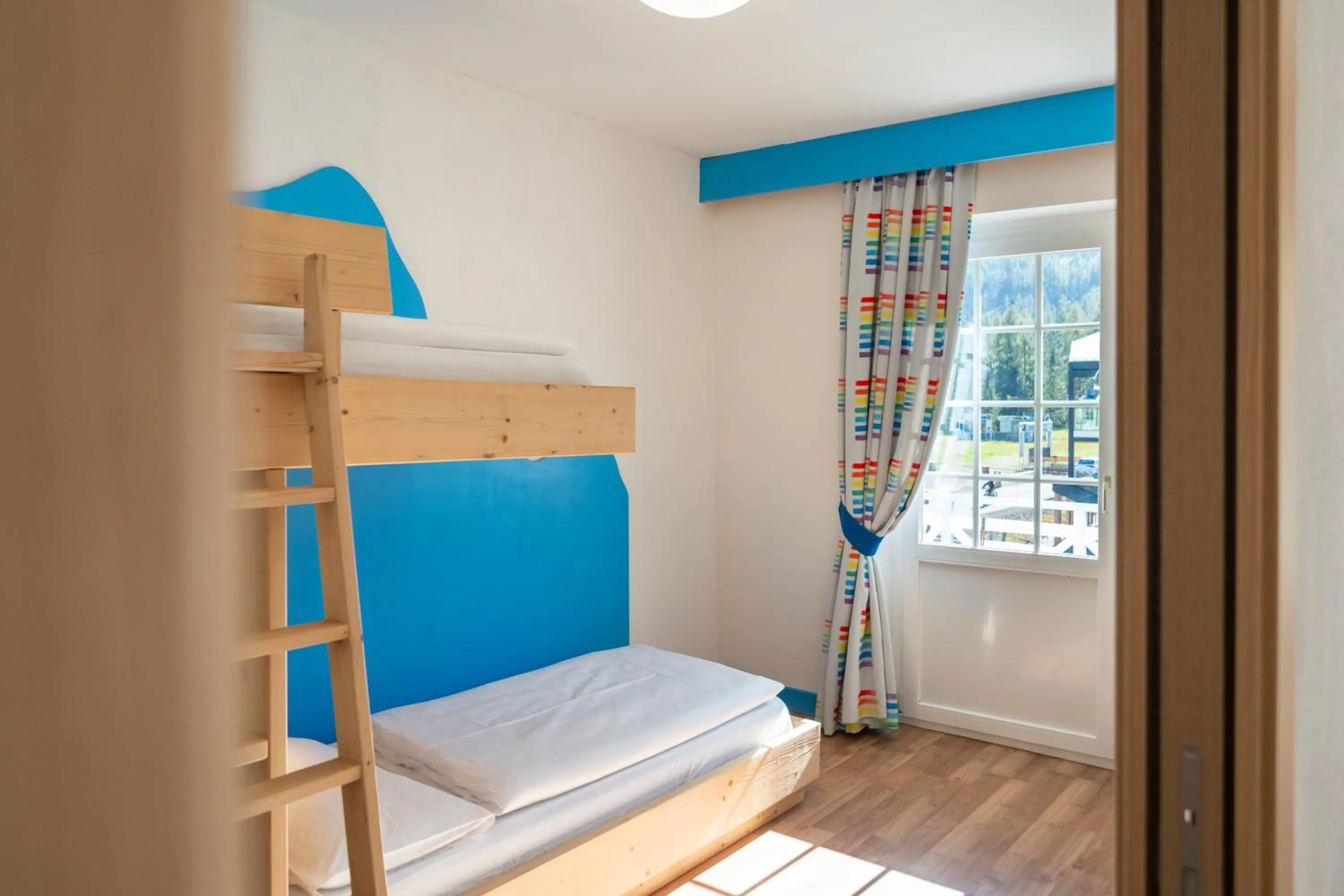 Bed in MyTime Hotels Savoy