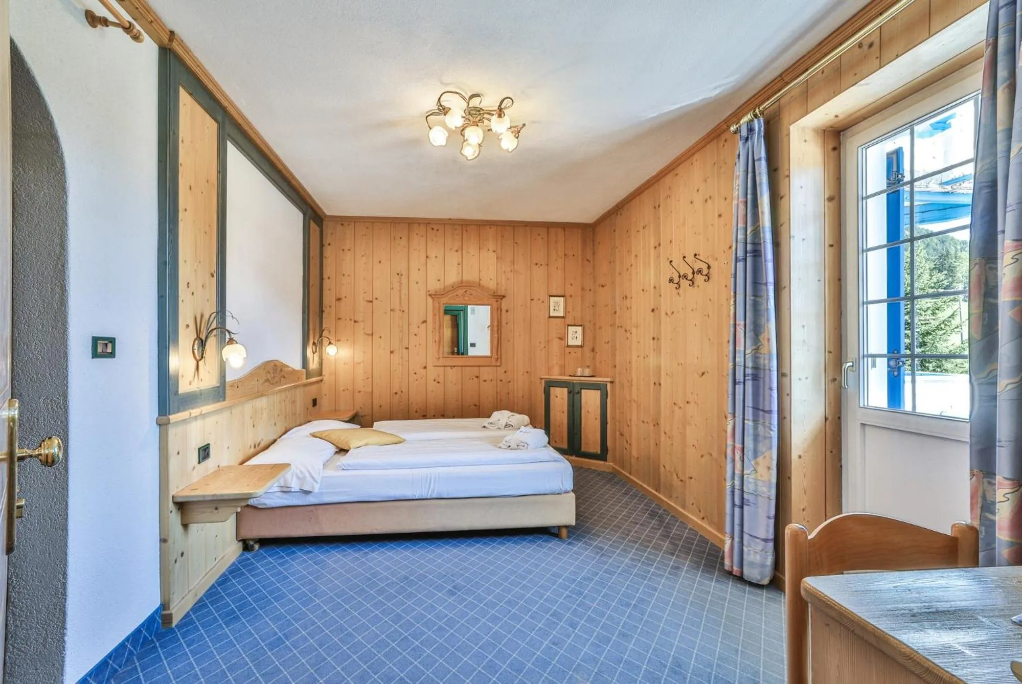 Bed in MyTime Hotels Savoy