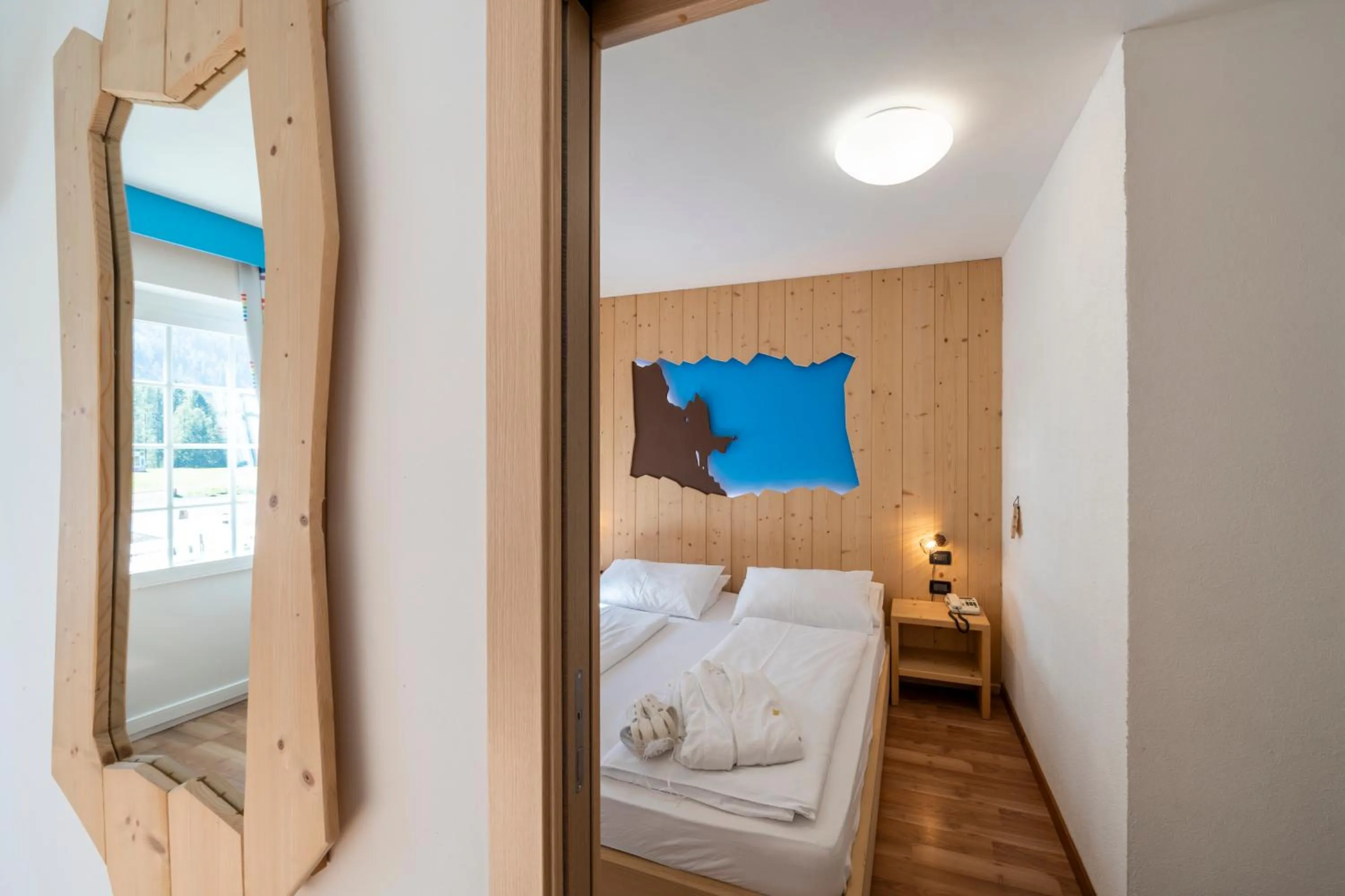 Bed in MyTime Hotels Savoy