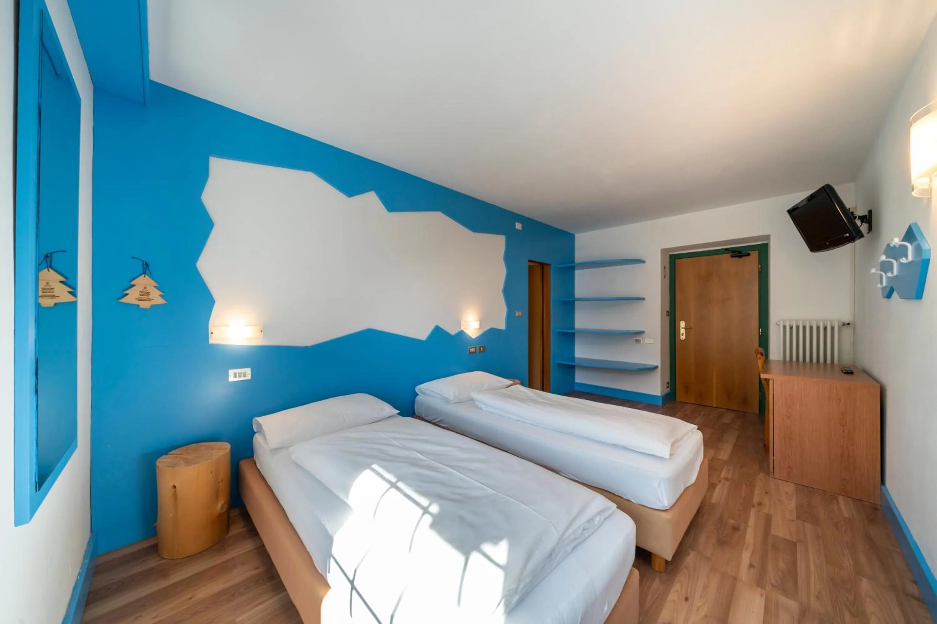 Bed in MyTime Hotels Savoy