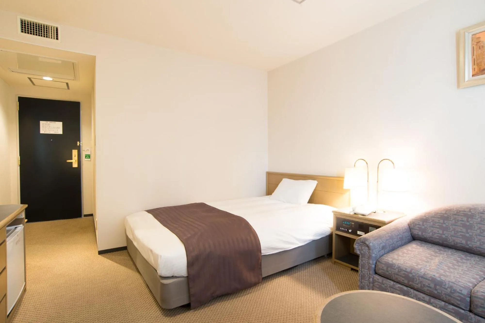 Bed in Hotel Suncrest