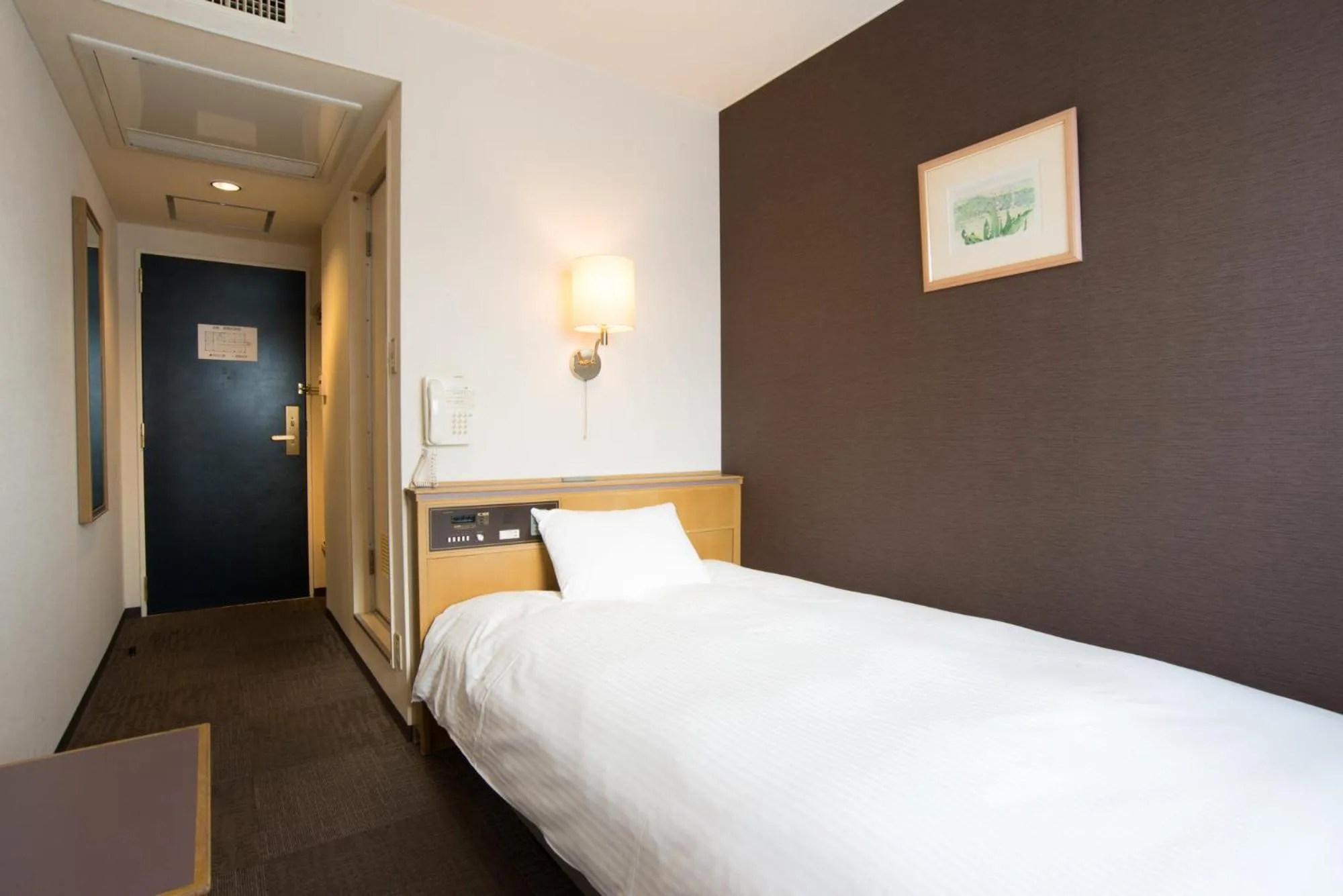 Bed in Hotel Suncrest