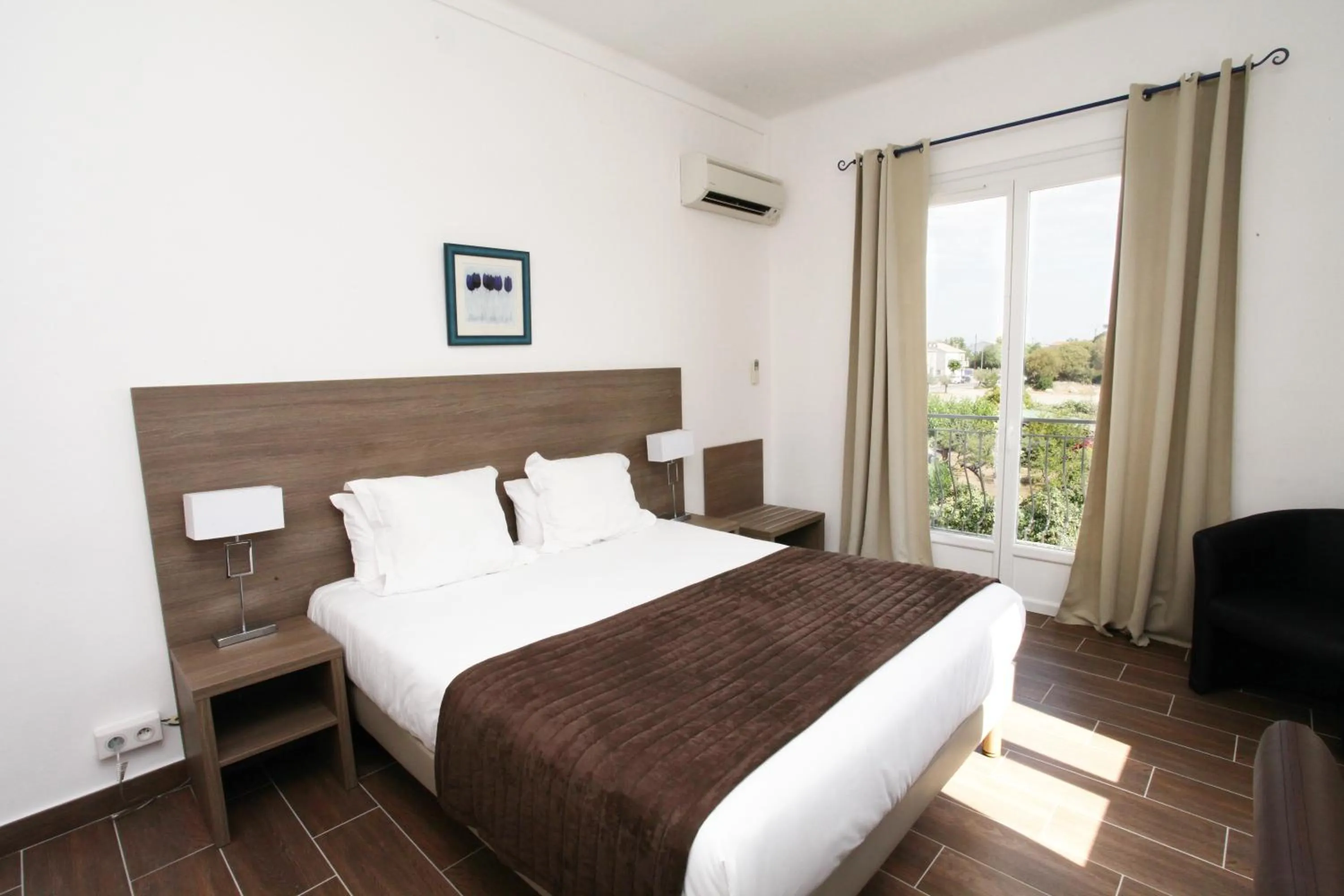 Photo of the whole room, Bed in Hôtel Des Nacres