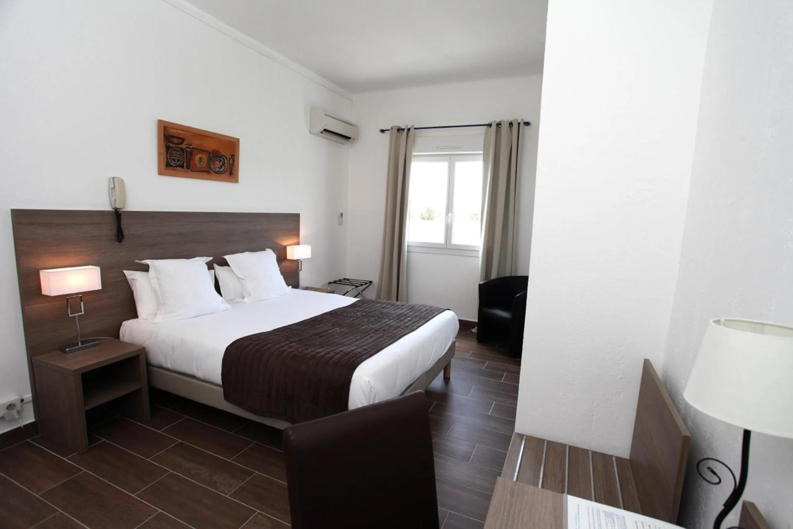 Photo of the whole room, Bed in Hôtel Des Nacres