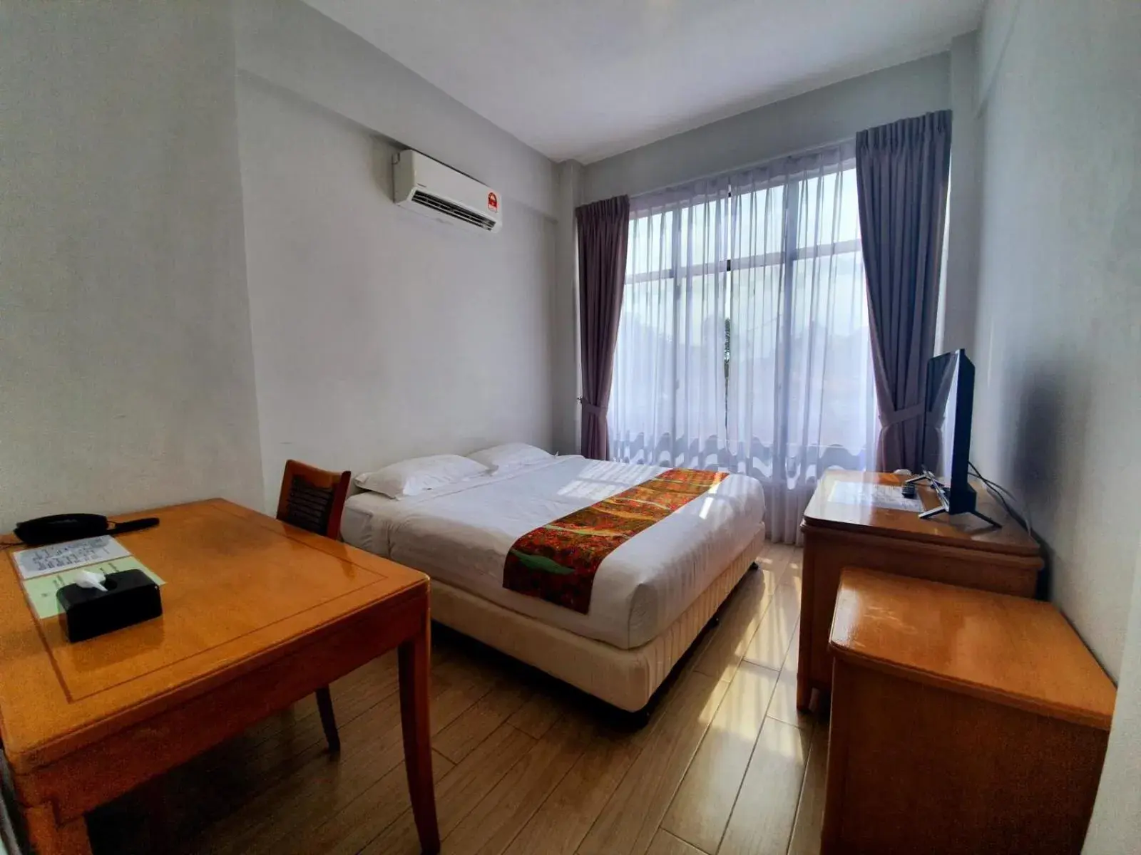 Bed in Adena Beach Resort Bed in Adena Beach Resort