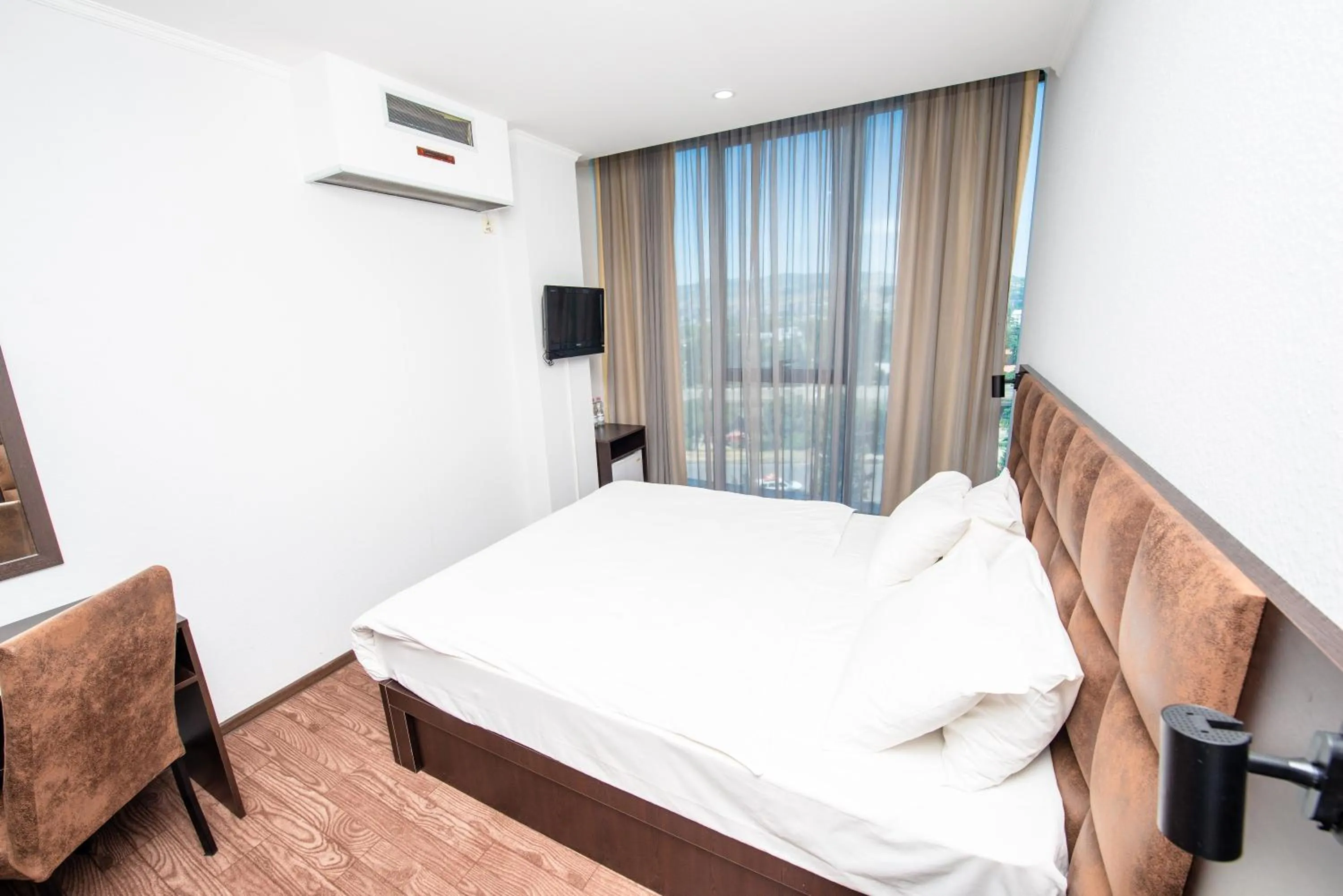 Bed in Hotel Shine Palace