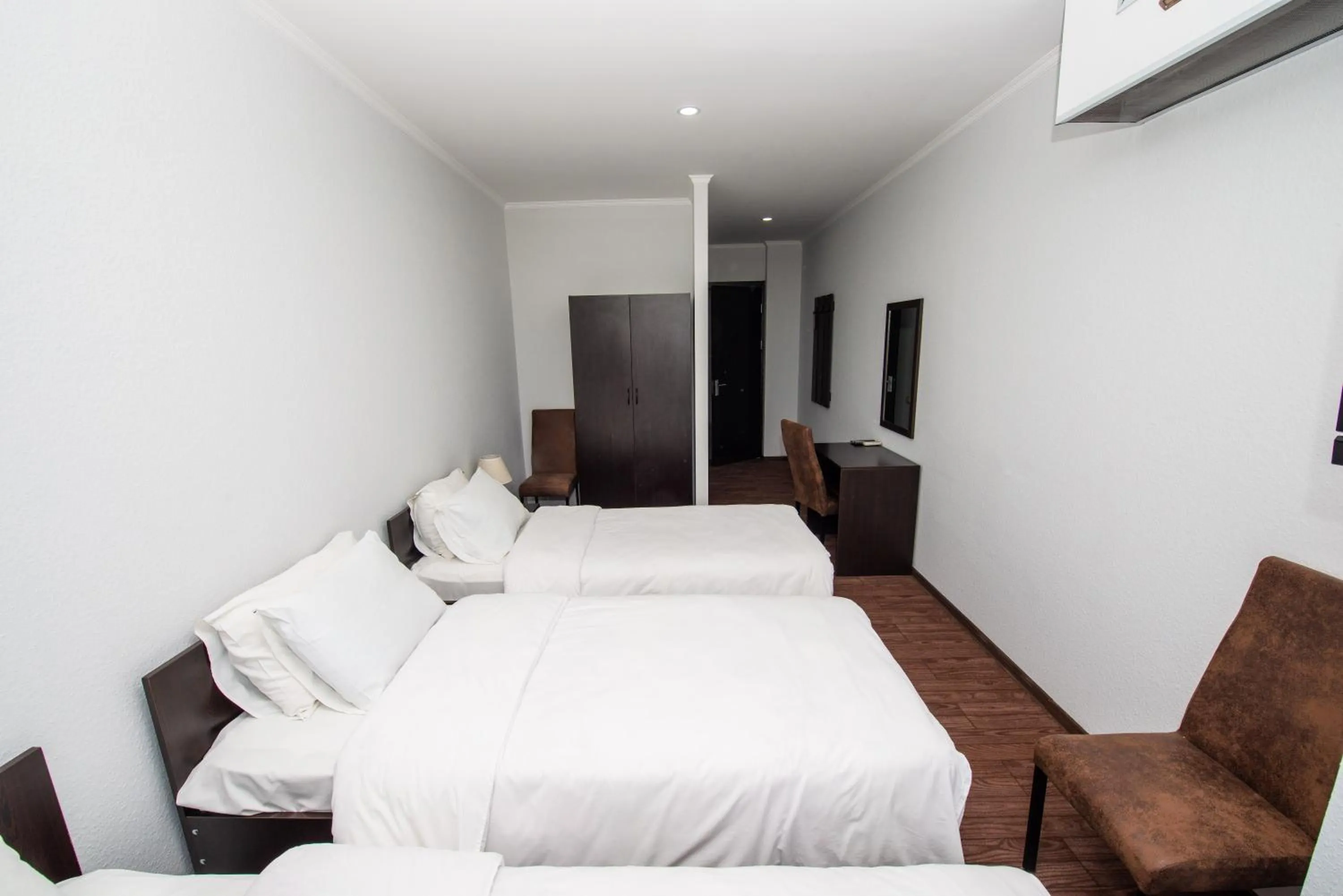 Bed in Hotel Shine Palace