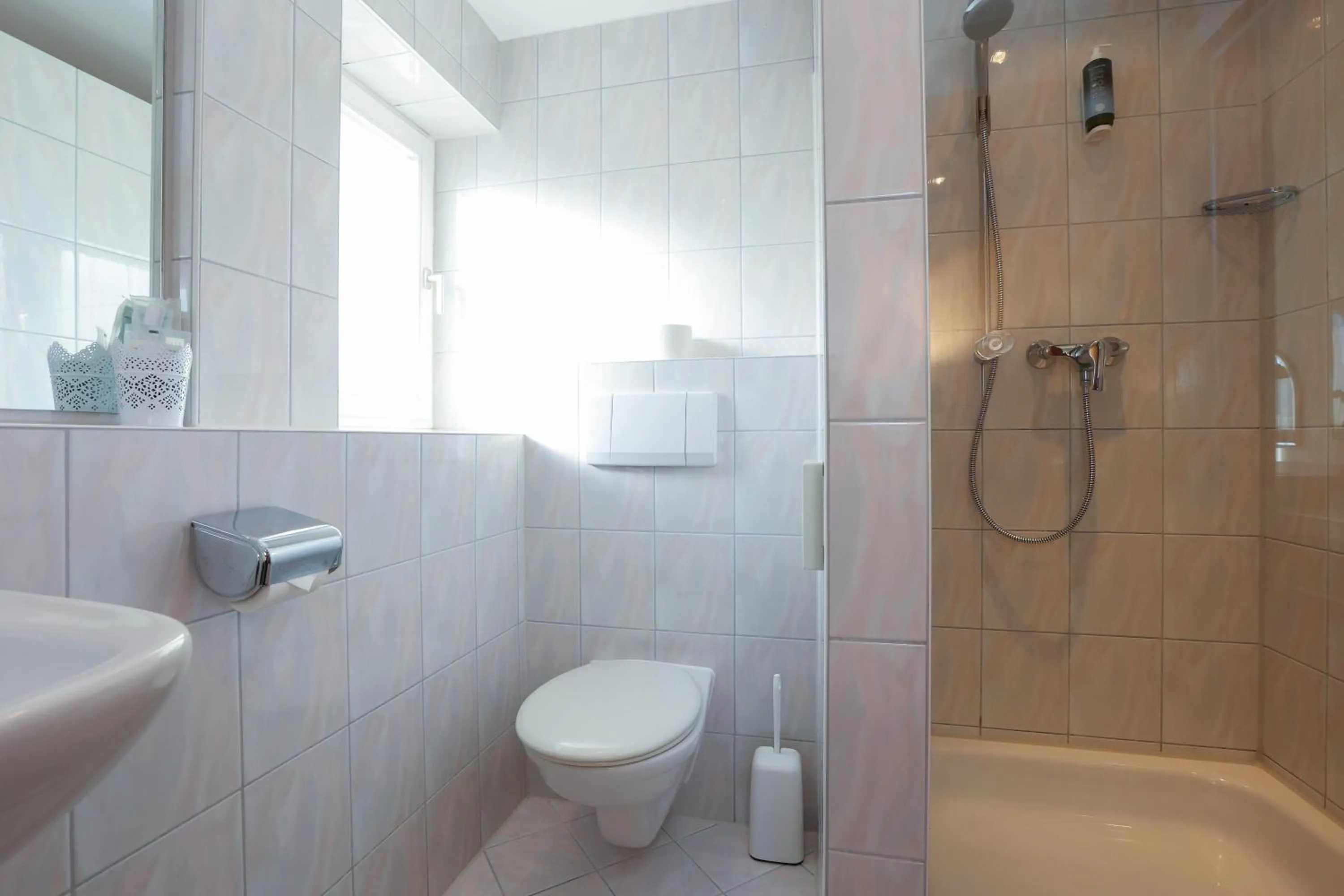 Bathroom in ANA Panorama, Trademark Collection by Wyndham