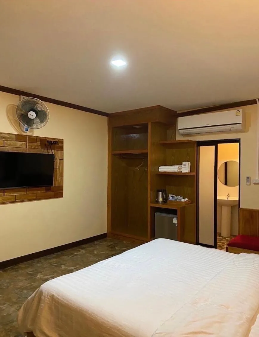 Bed in Baan Suan Nam Resort