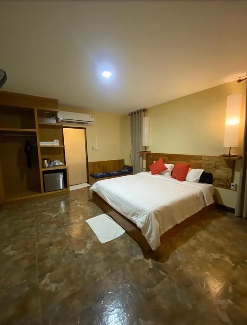 Bed in Baan Suan Nam Resort