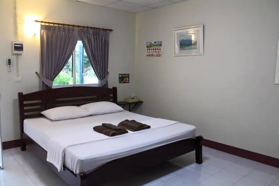 Bed in Baan Suan Nam Resort