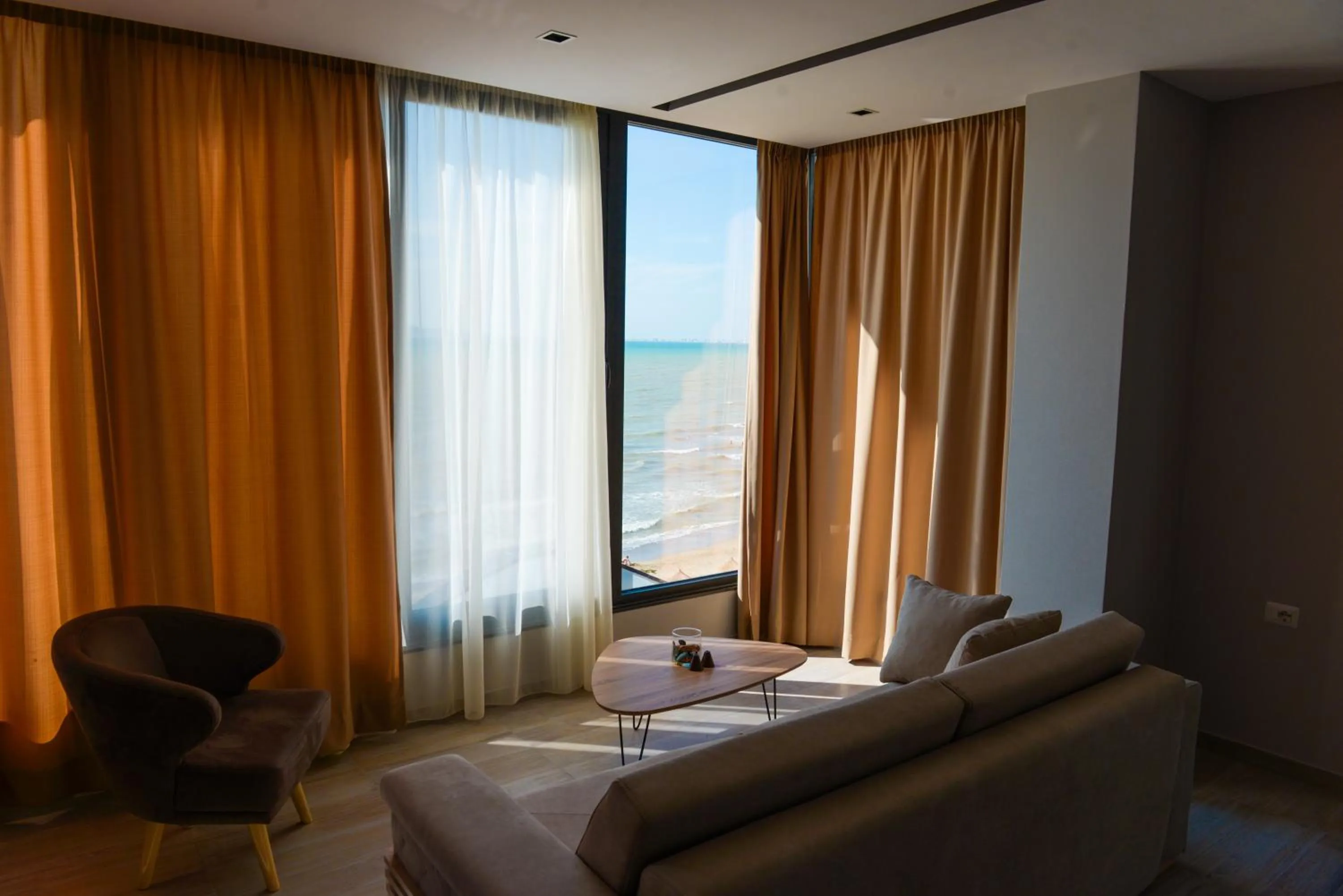 Seating area, Bed in Brilliant Hotel & SPA