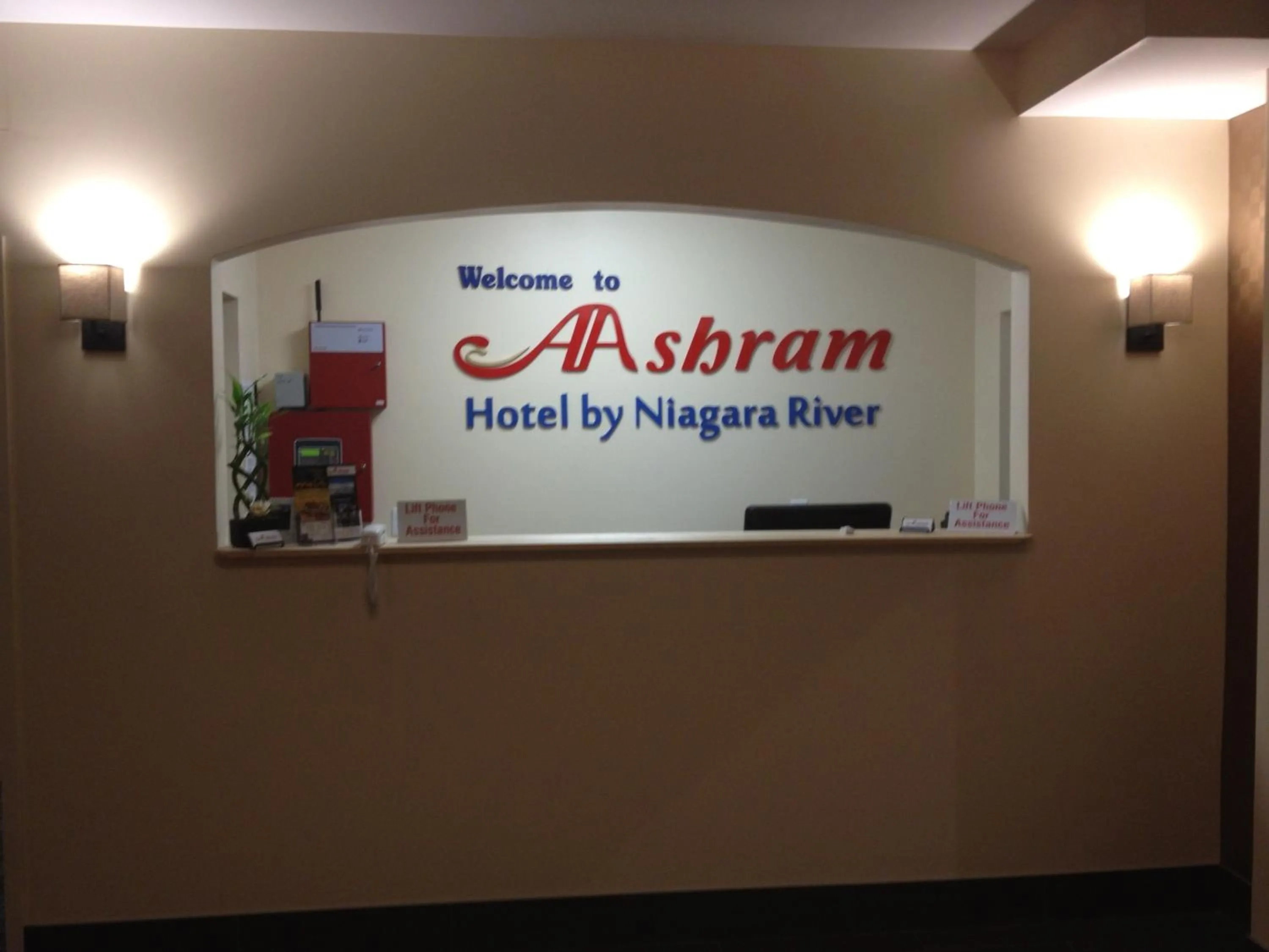 Logo/Certificate/Sign in Aashram Hotel by Niagara River