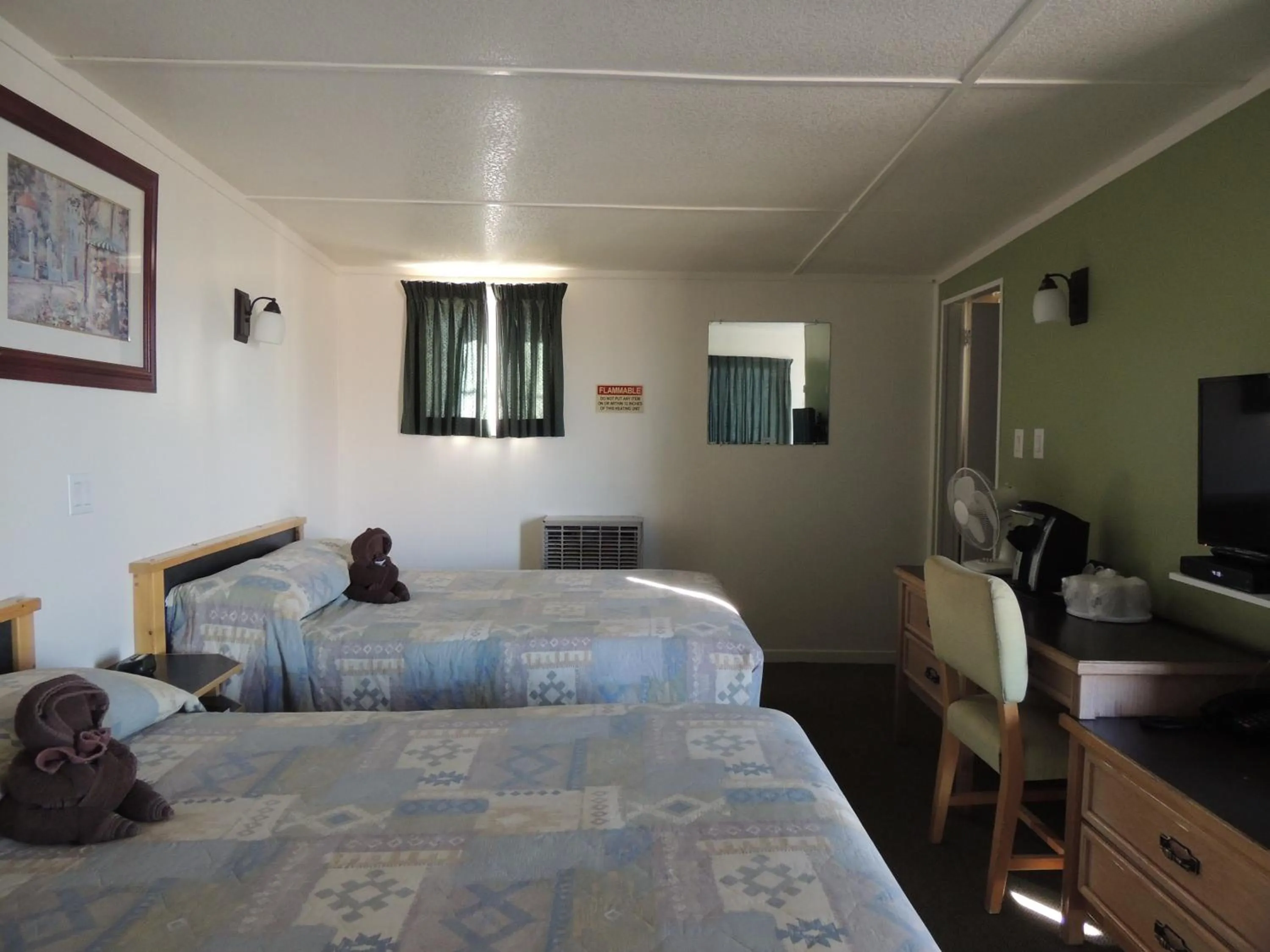 Photo of the whole room, Bed in 100 Mile Motel & RV Park