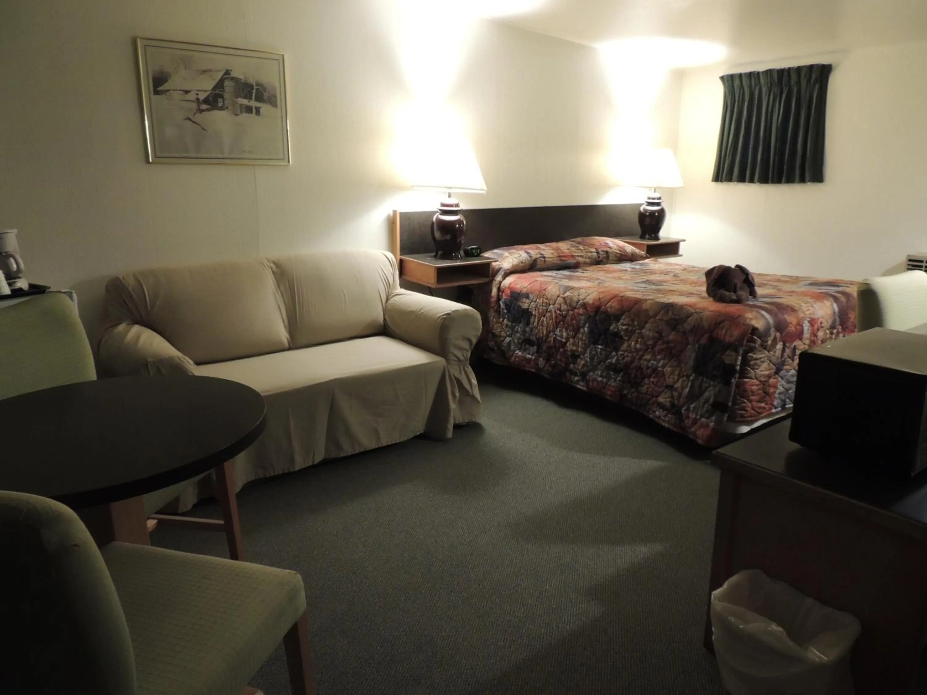 Photo of the whole room, Bed in 100 Mile Motel & RV Park