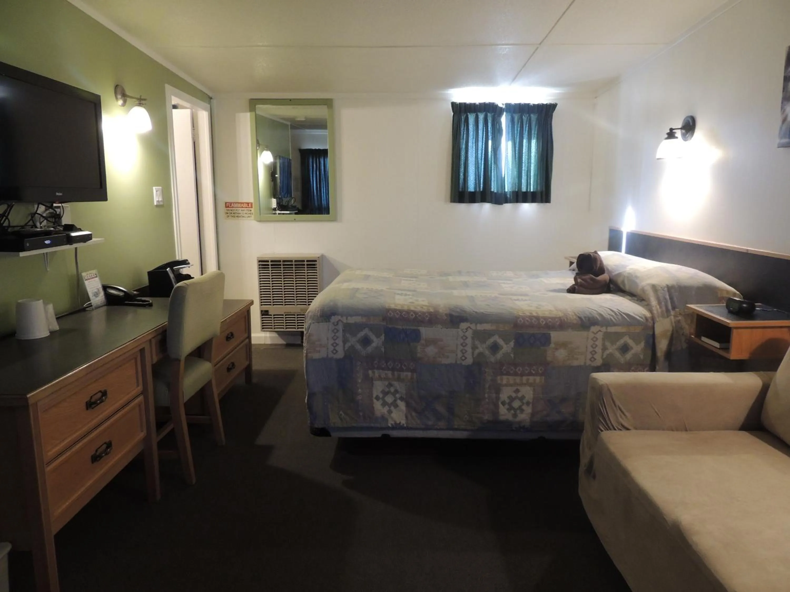 Photo of the whole room, Bed in 100 Mile Motel & RV Park